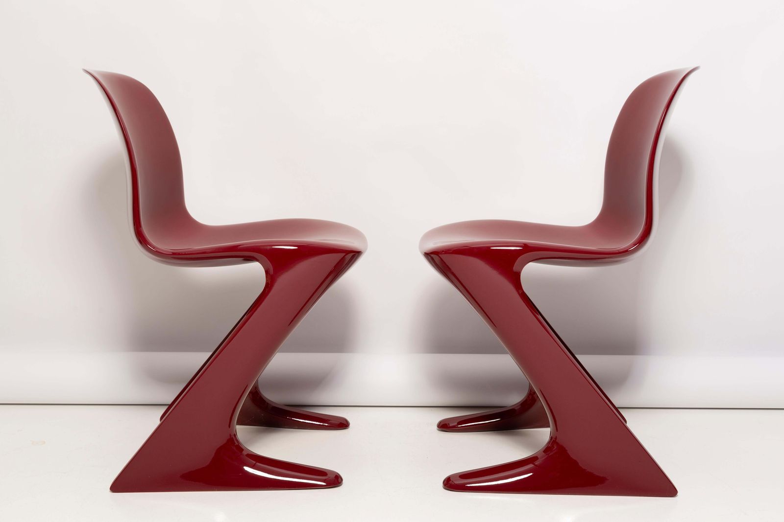 Set Of Six Dark Red Wine Kangaroo Chairs Designed By Ernst Moeckl, Germany, 1968 photo for sale