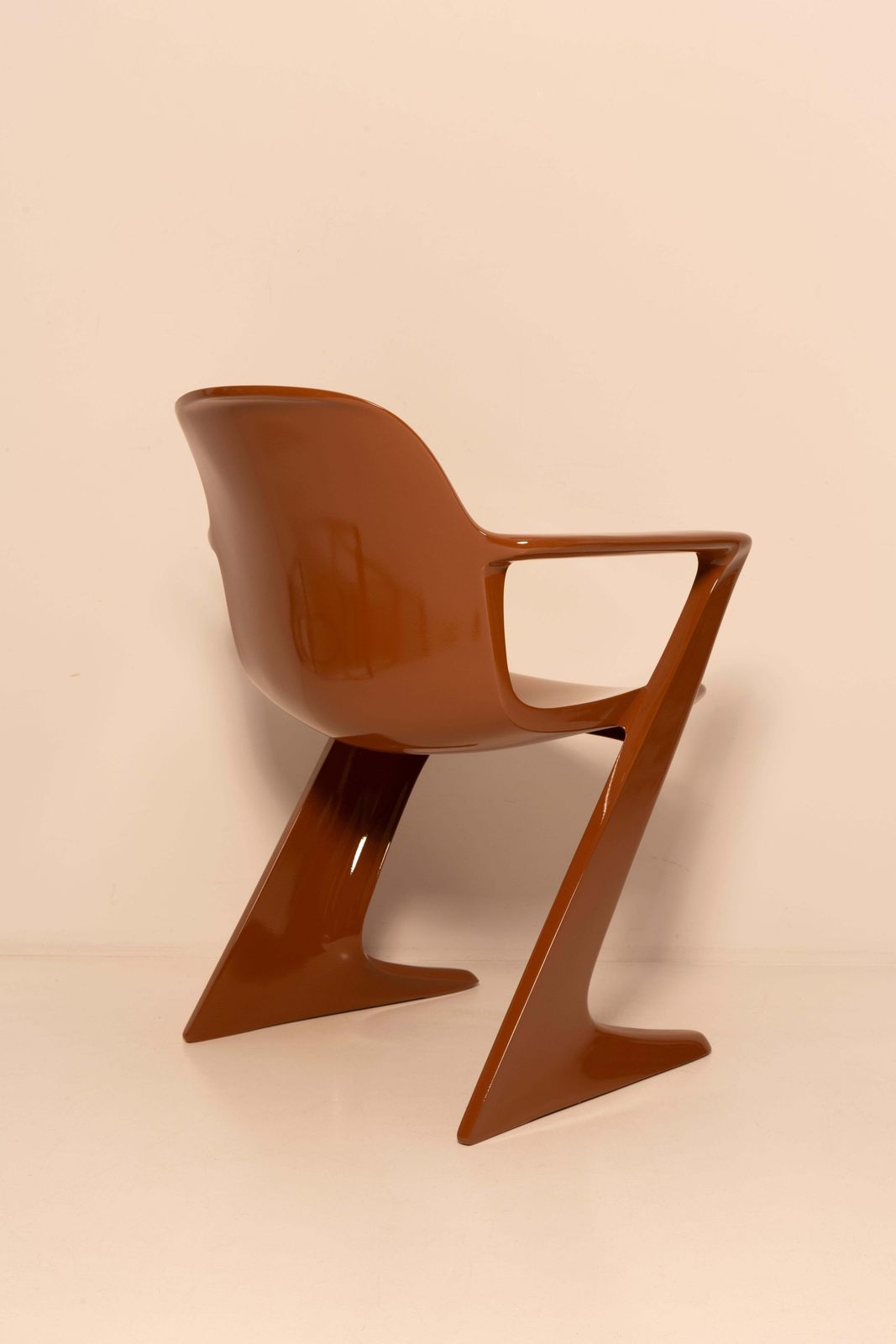 photo furniture Set Of Eight Mid Century Mocha Pantone Kangaroo Chairs, Ernst Moeckl, Germany