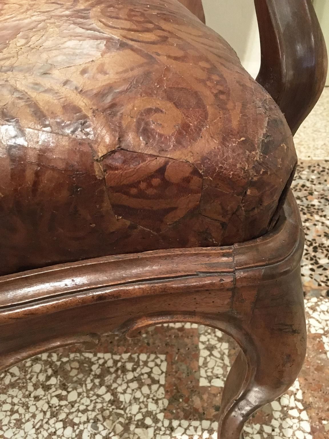 photo buy 1750 Venezia Pair Of Armchairs In Carved Walnut Original Embossed Leather Covers