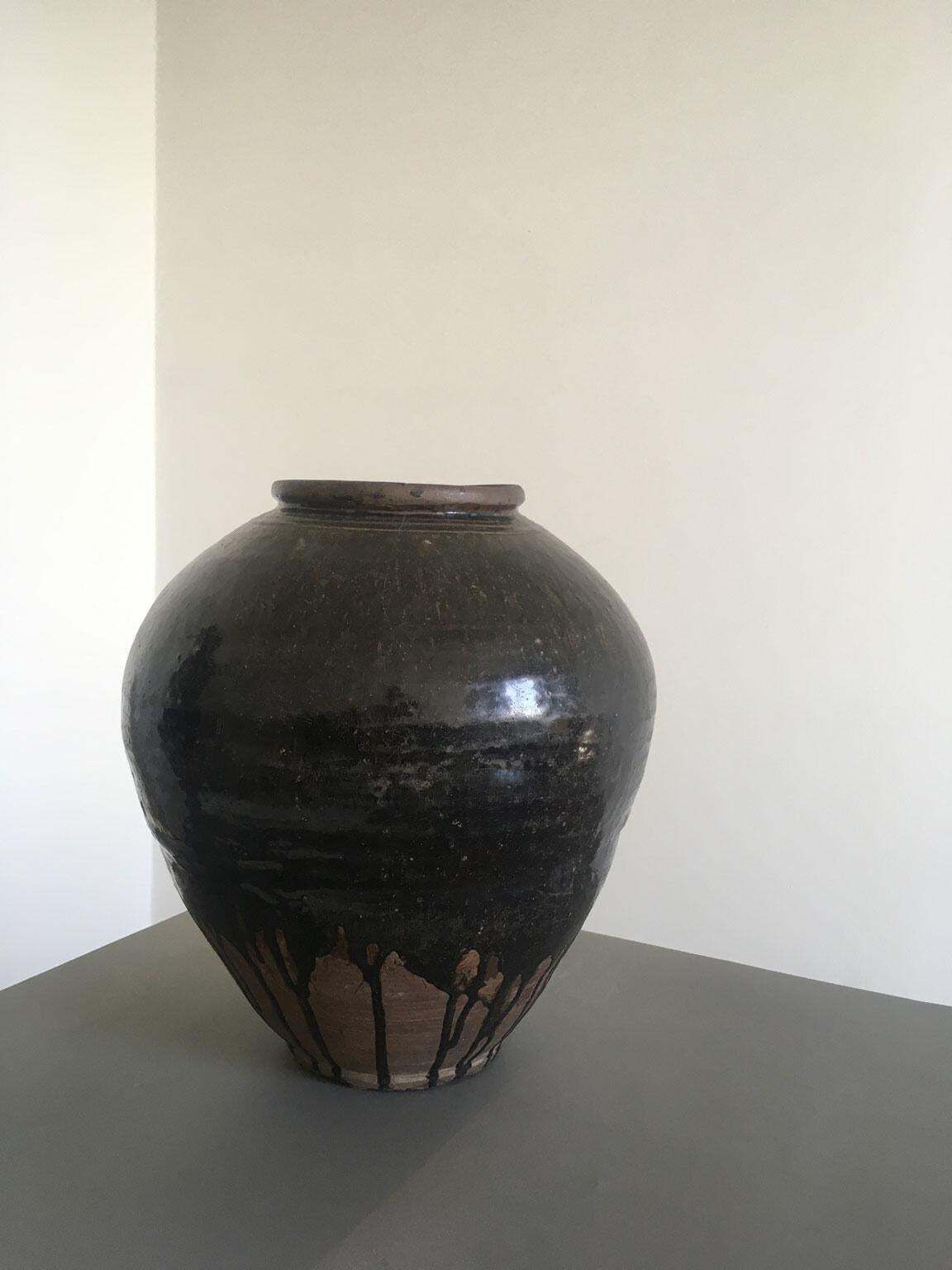 6799.0 Late 18th Century Khmer Brown Glazed Terracotta Vase photo