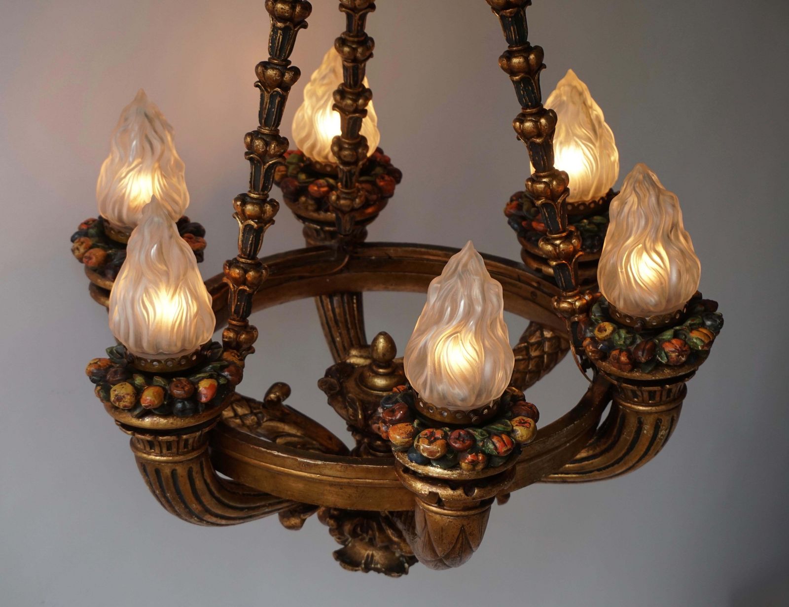 photo furniture Wonderful Italian Giltwood Cherubs Putti And Painted Fruit Torch Chandelier