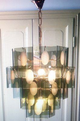 Mid Century Chandelier With Frosted Glasplates And Relief photo Lighting