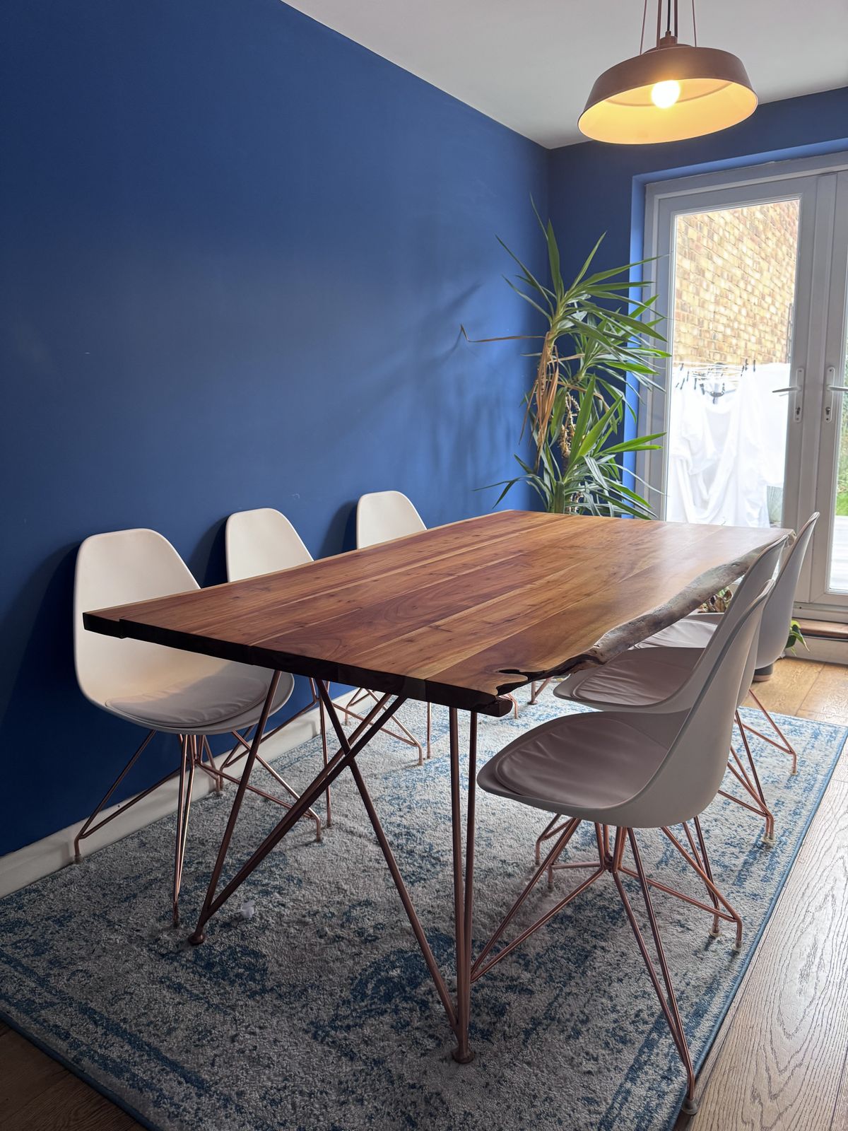 photo for sale Modern White Molded Plastic Chair With Stylish Rose Gold Metal Legs