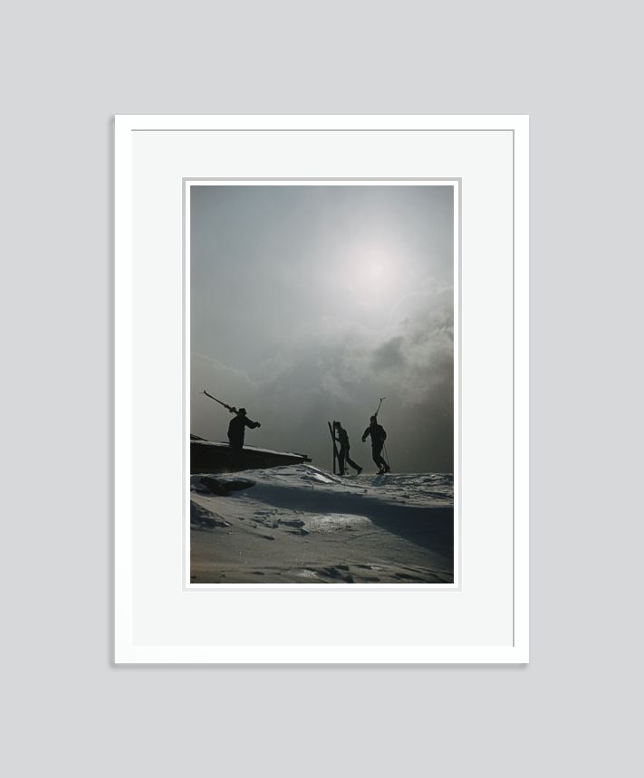 Slim Aarons 'Cranmore Mountain Skiers' Framed White photo furniture