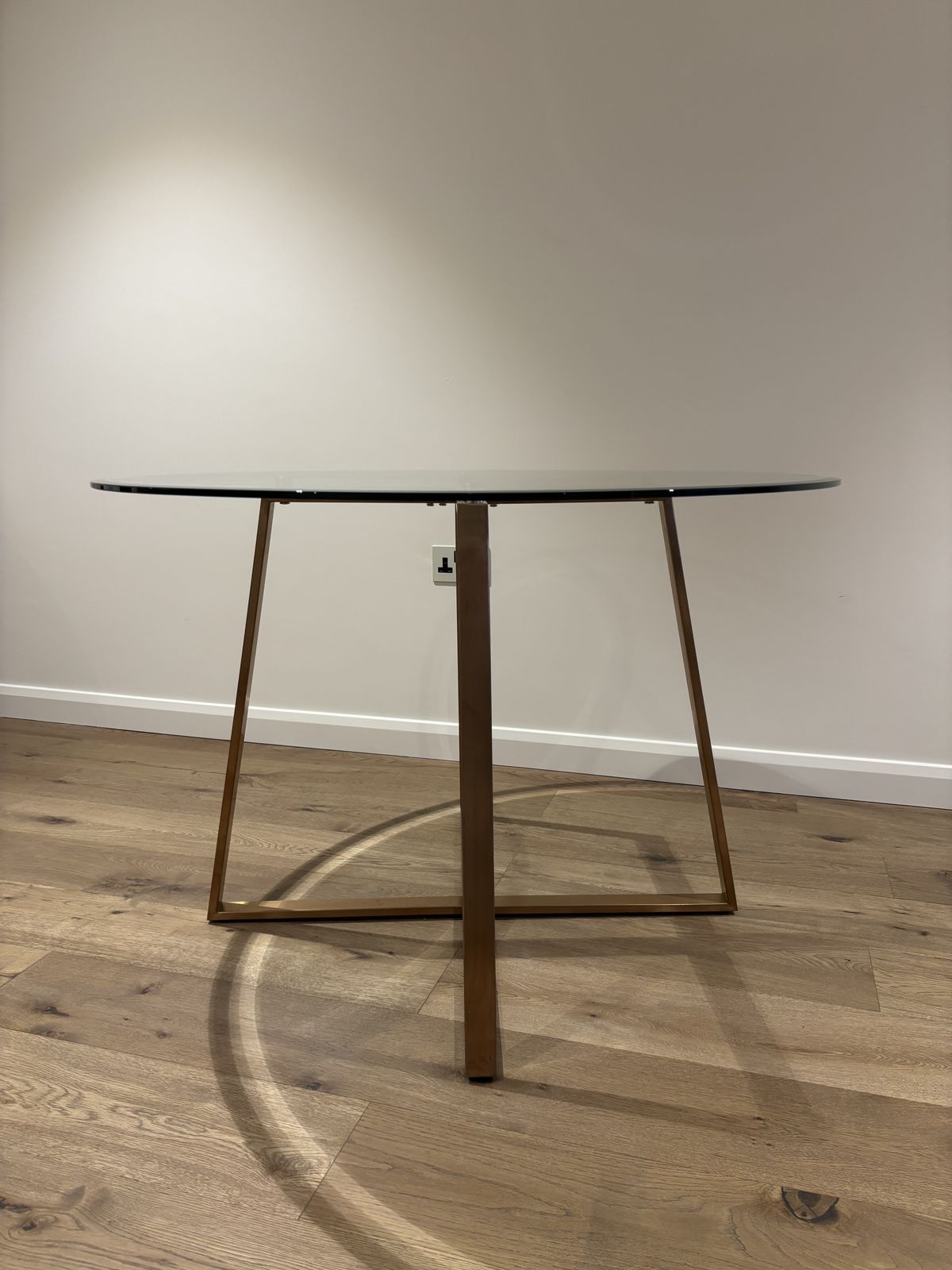 Made   Haku 4 Seater Round Dinning Table In Brass And Smoked Glass photo furniture
