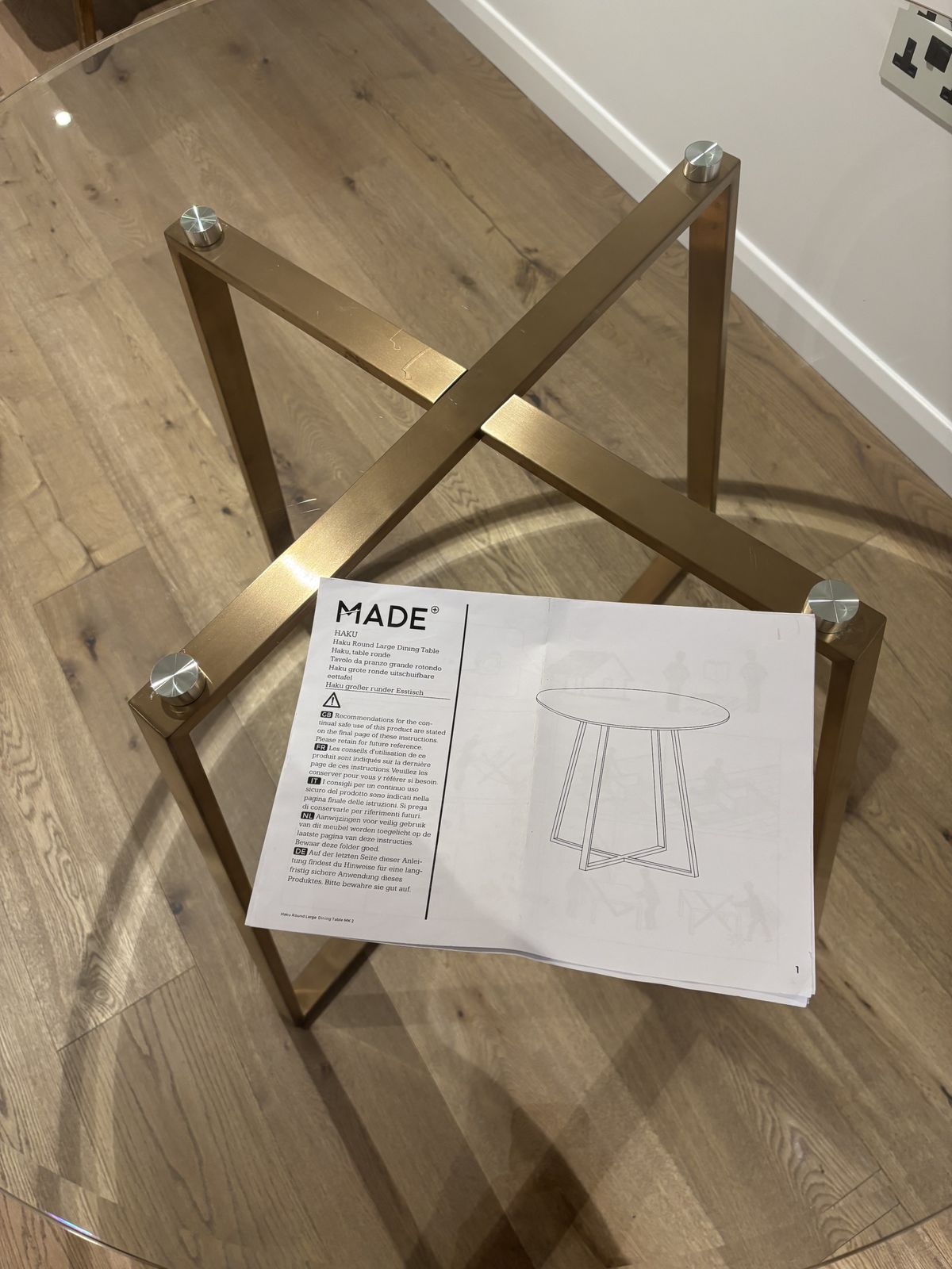 Made   Haku 4 Seater Round Dinning Table In Brass And Smoked Glass photo Furniture