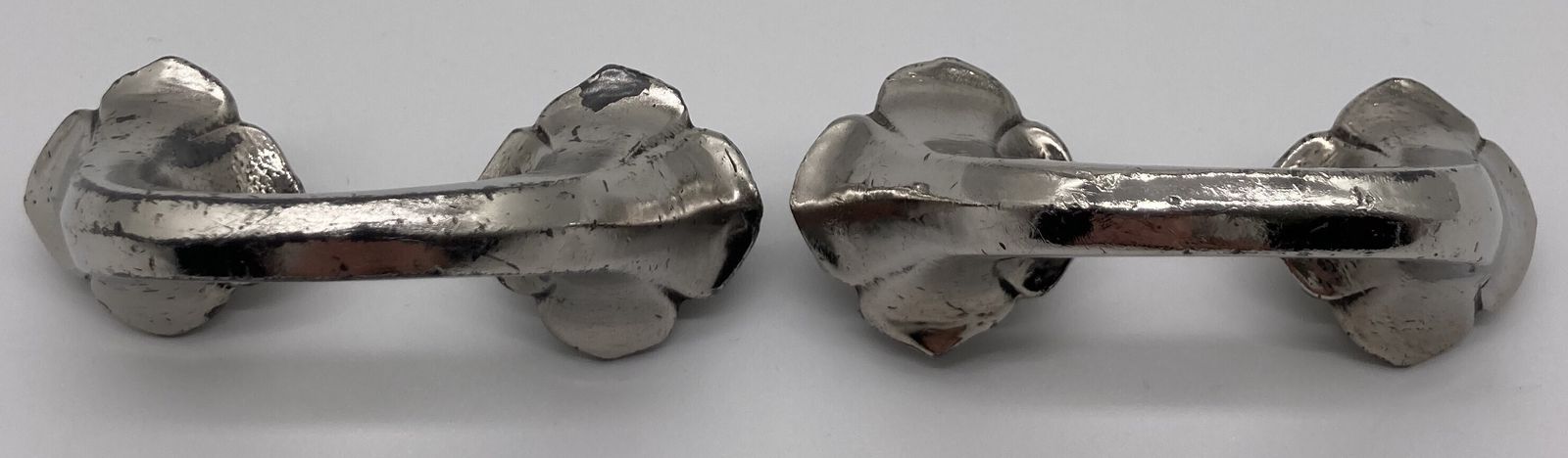 A Pair Of Edwardian Silver Plated Cupboard Handles