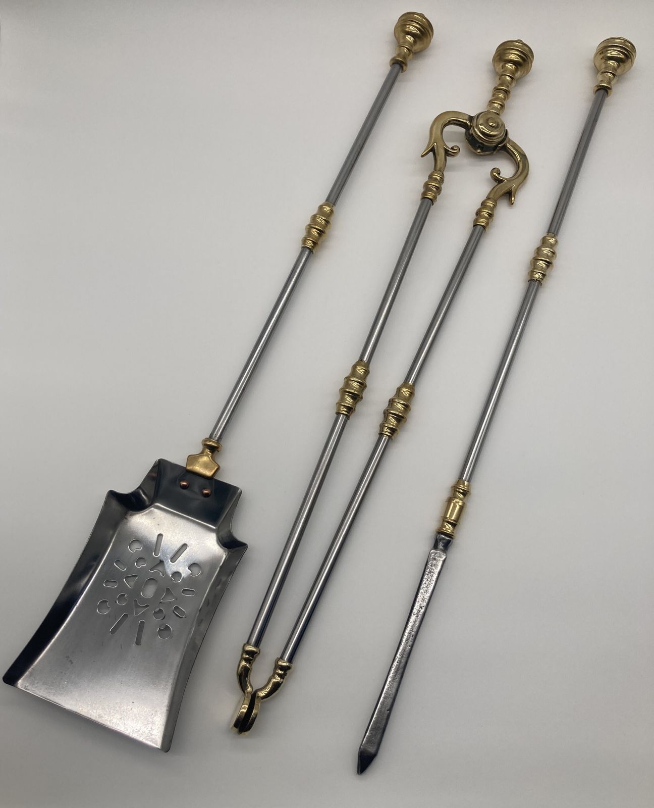 A Set Of Steel And Brass Victorian Fire Irons photo furniture