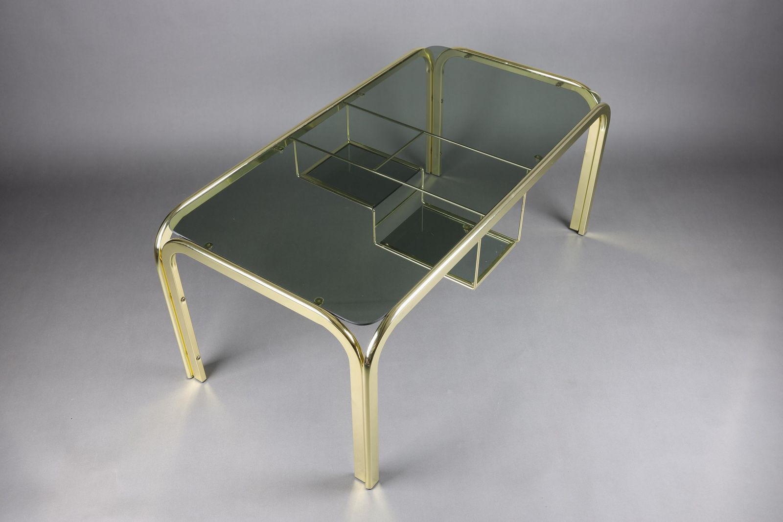 Vintage 1970s Smoked Glass Coffee Table With Gold Accents | Glass Top Table For Living Room | Rectangular Coffee Table With Storage Shelf photo furniture