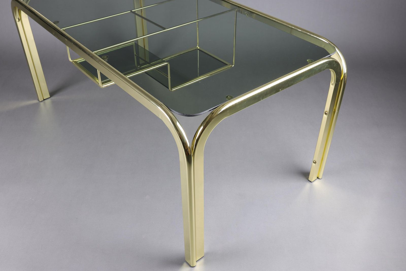 Vintage 1970s Smoked Glass Coffee Table With Gold Accents | Glass Top Table For Living Room | Rectangular Coffee Table With Storage Shelf photo vintage