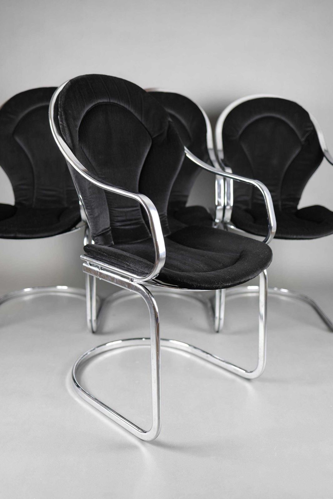 1970s Gastone Rinaldi Chrome Dining Chairs Set Of 4 | Mid Century Modern Furniture | Retro Dining Chairs With Black Cushions photo for sale