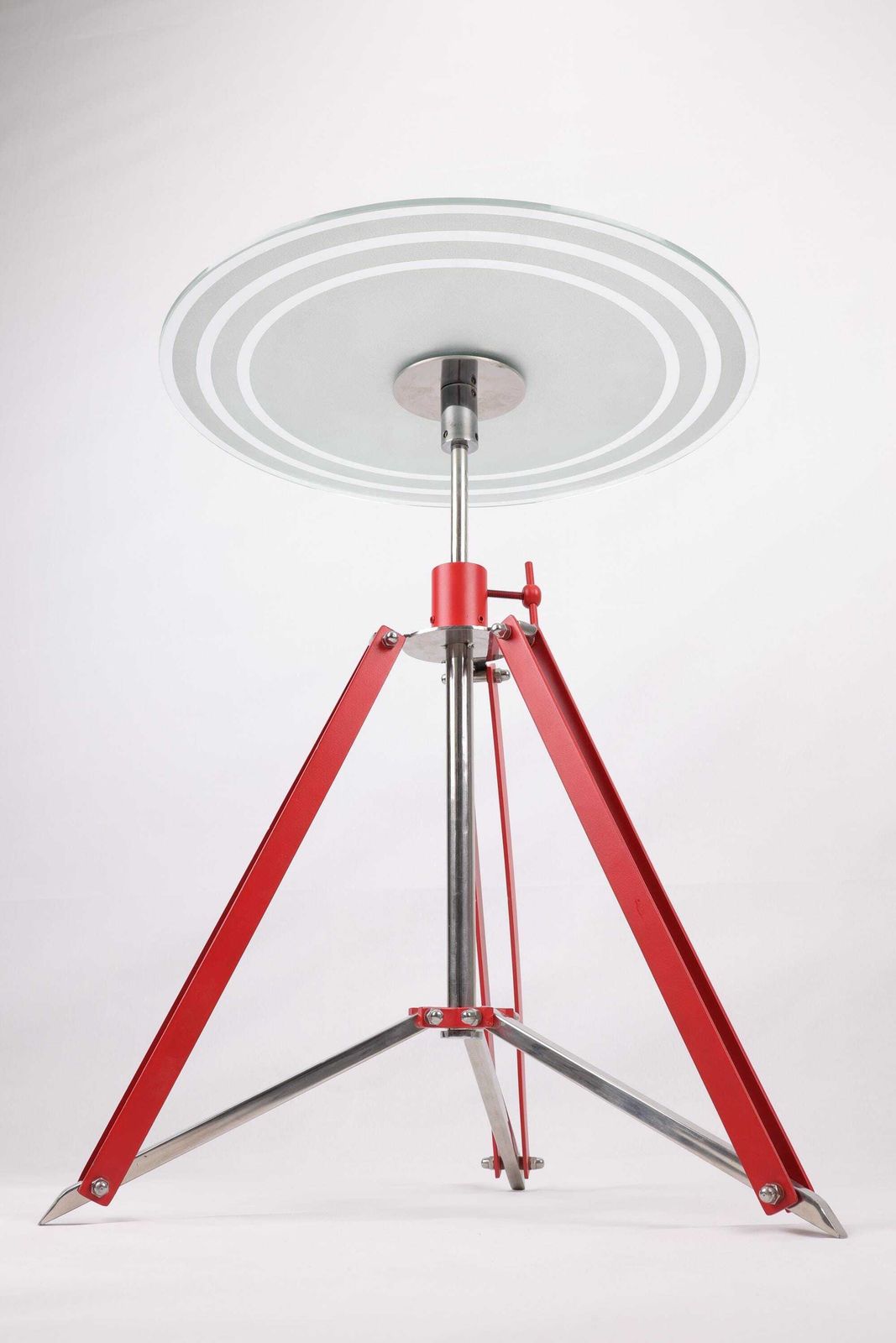 Vintage Adjustable Height Tripod Table | Modern Industrial Glass Side Table | Red Metal And Stainless Steel Base | Compact Foldable Design photo for sale