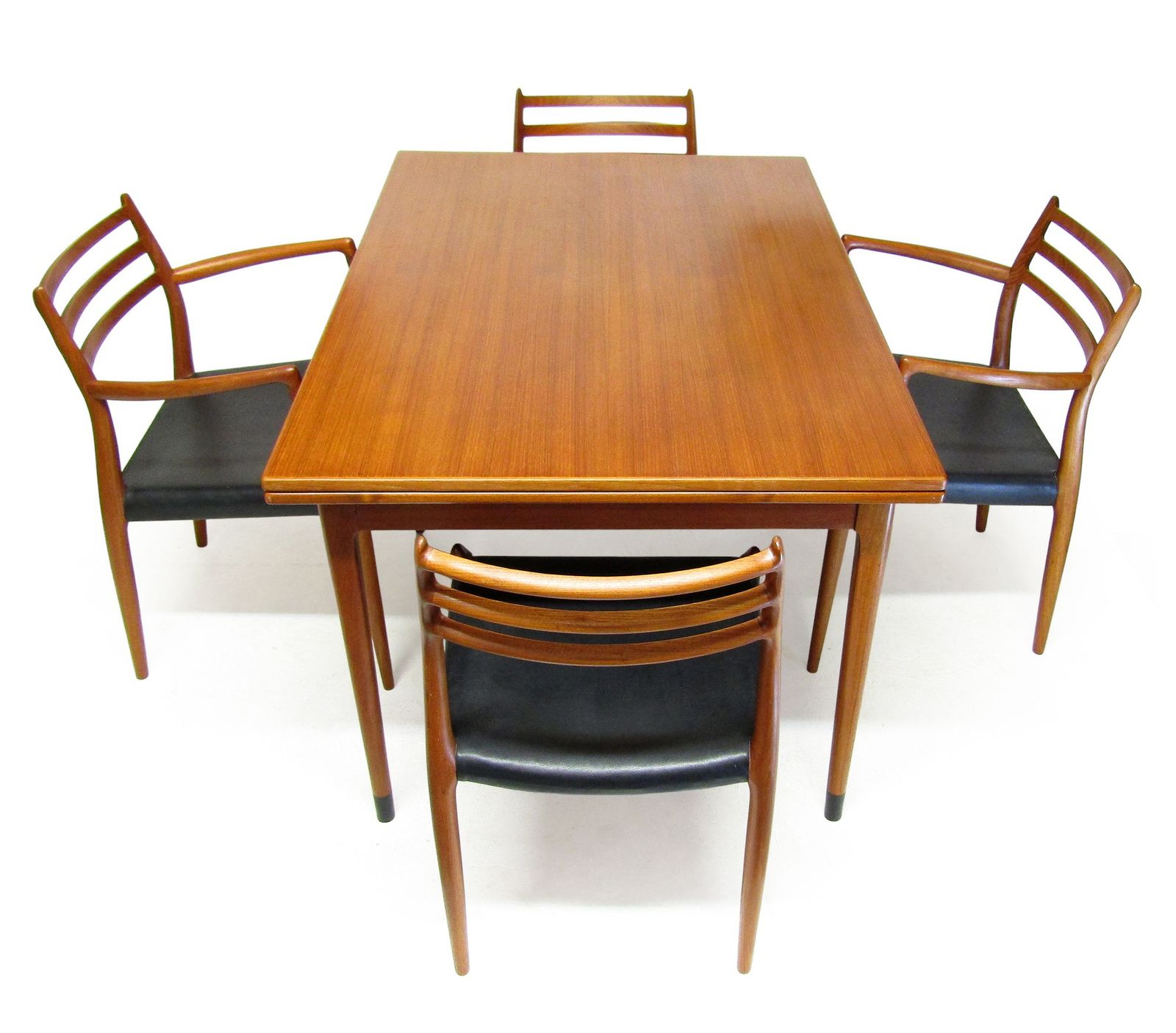 photo for sale 1950s Danish Extending Model 9 Banqueting Dining Table In Teak By Niels Moller