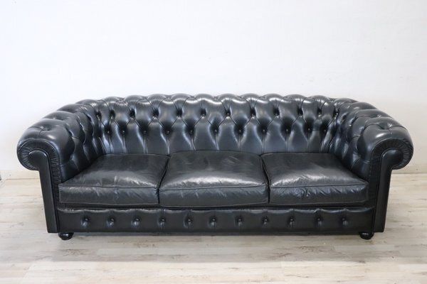photo buy Set Of Sofa And Armchair In Black Leather, 1980s