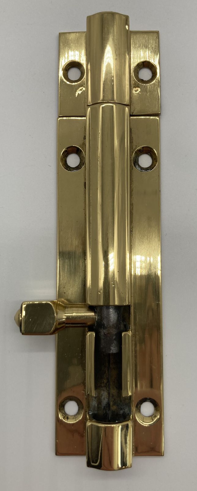 A Small Brass Door Bolt photo furniture