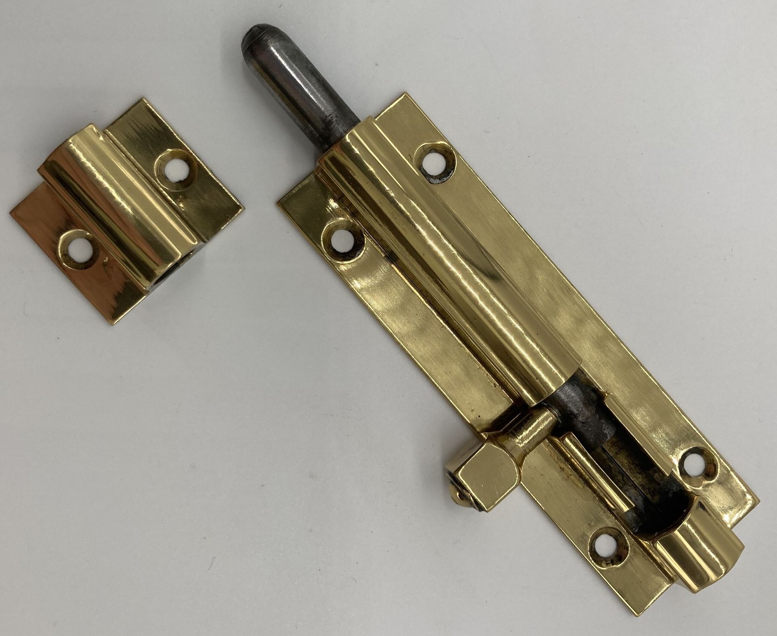 A Small Brass Door Bolt photo Home Fixtures