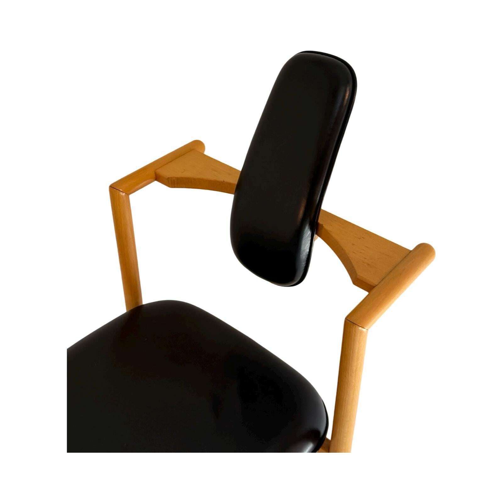 Peter Opsvik   Stokke   Flysit   Ergonomically Shaped Rocking Chair   Black Leather Upholstery And Wooden Frame photo for sale