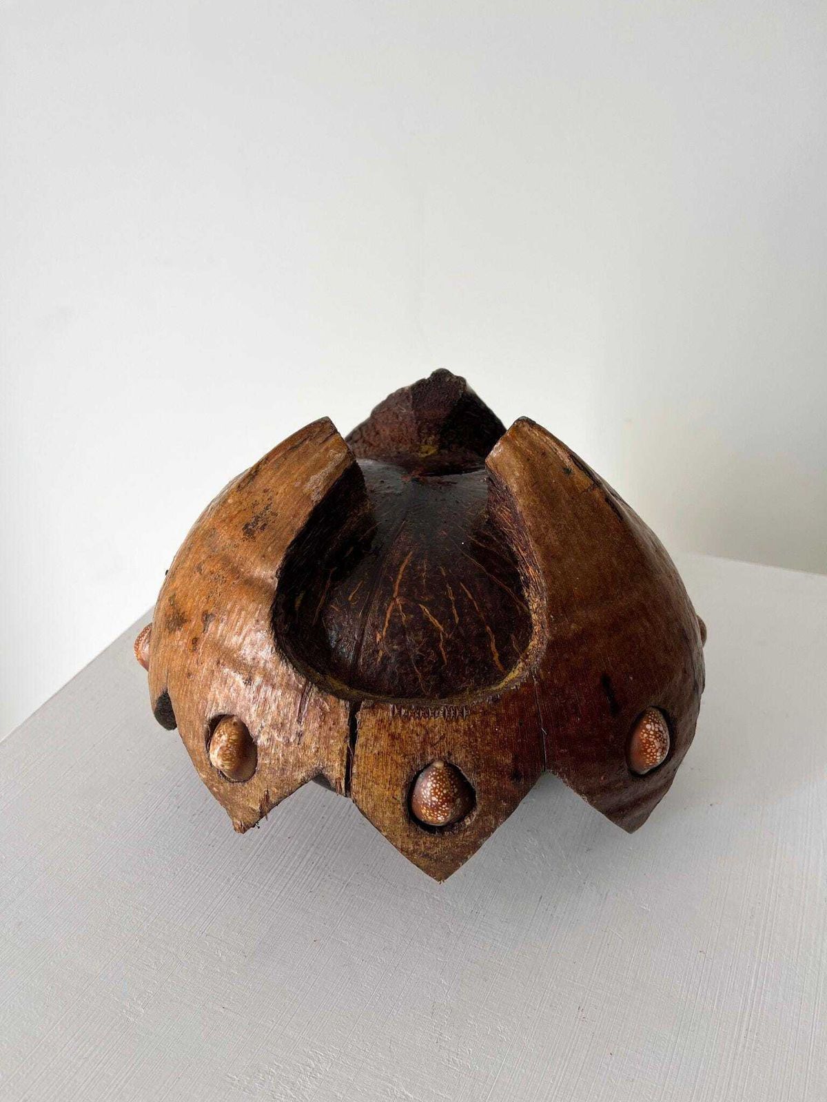 Carved Coconut Shell Bowl Sculpture With Shell Decoration And Zig Zag Profile Design photo 230.0