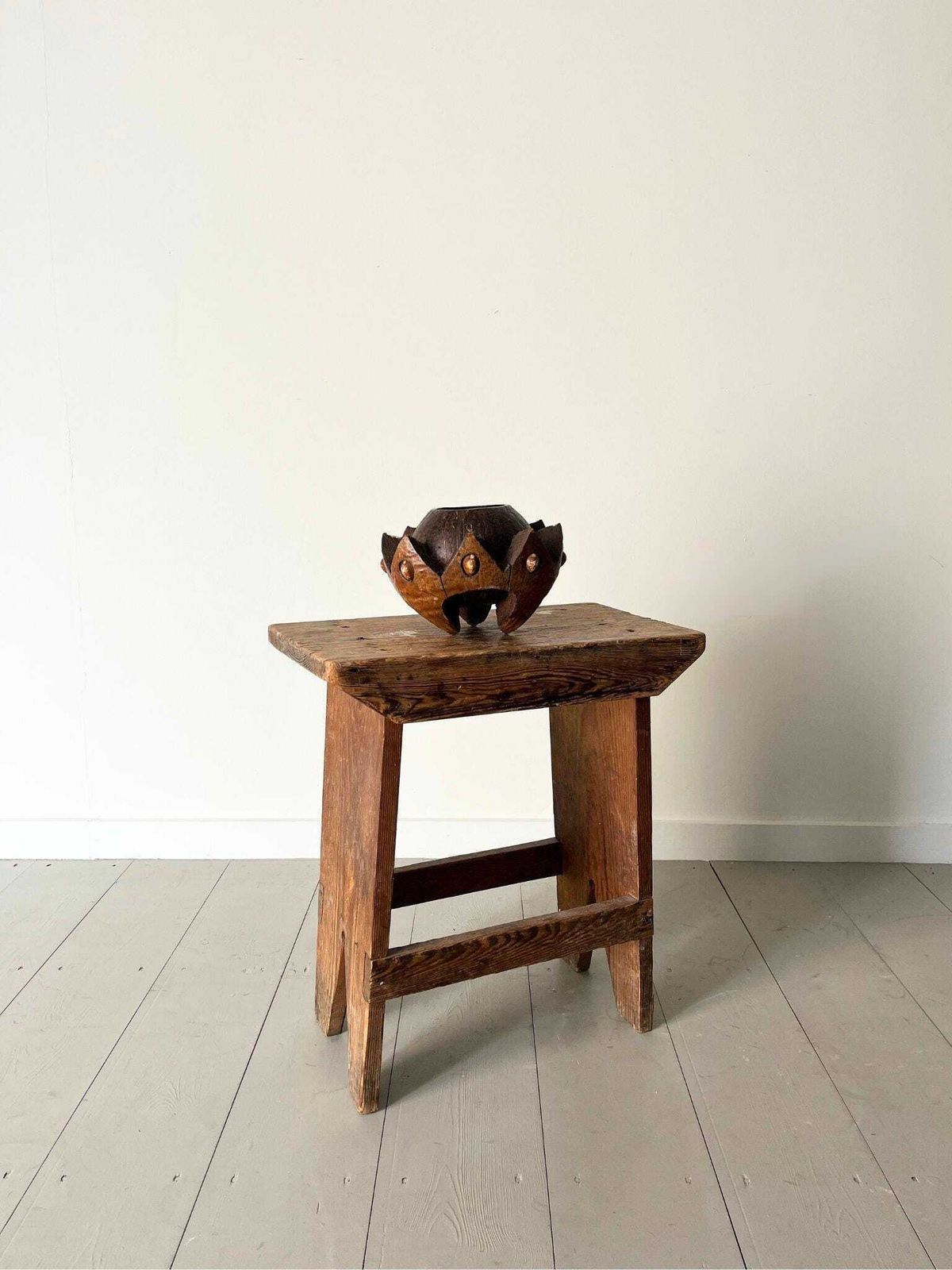 Carved Coconut Shell Bowl Sculpture With Shell Decoration And Zig Zag Profile Design photo vinterior