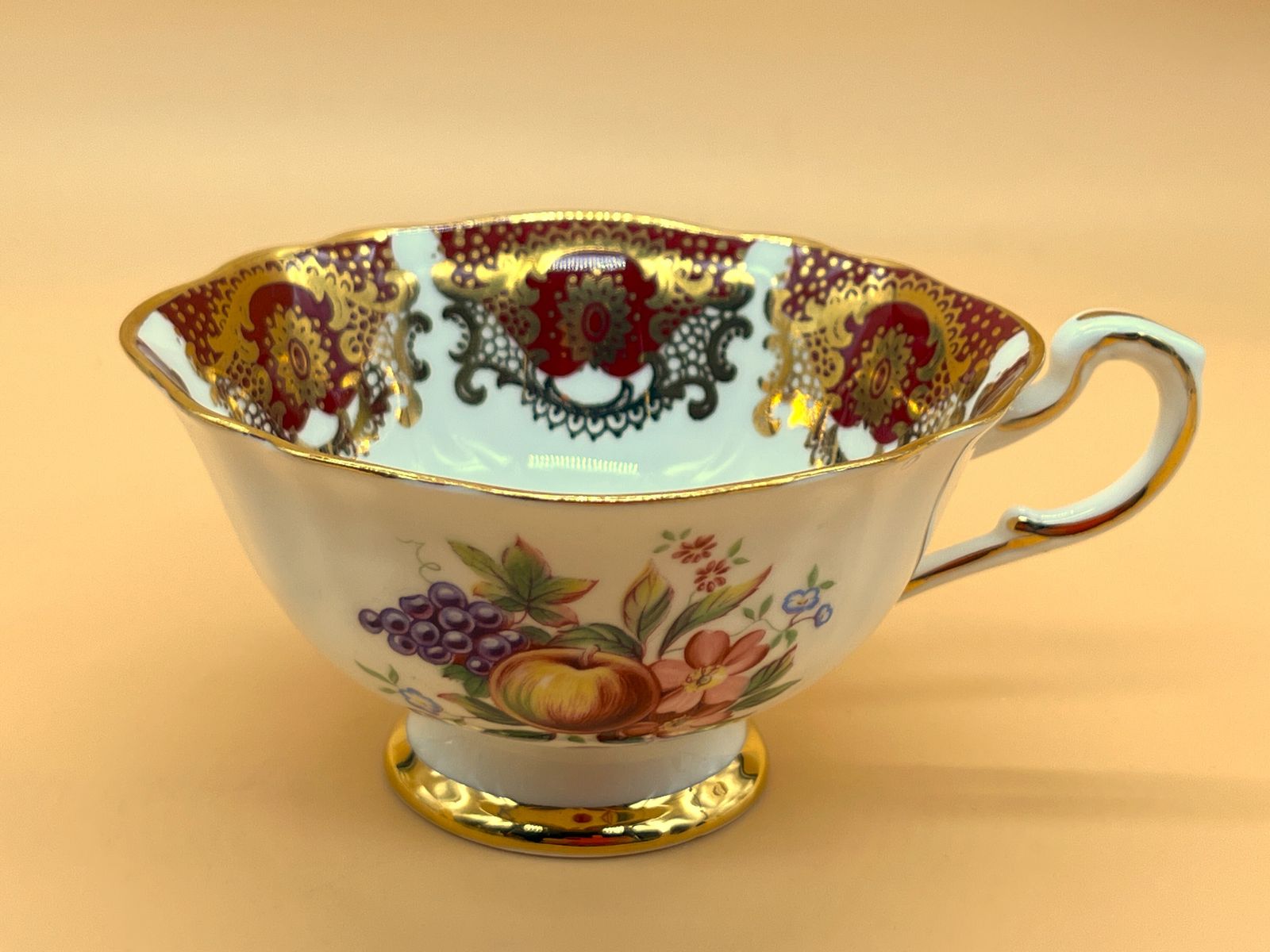 Vintage Paragon China Quatrefoil Shape Red And Gold With Pink Chintz Centre Tea Cup And Saucer Duo. photo vinterior