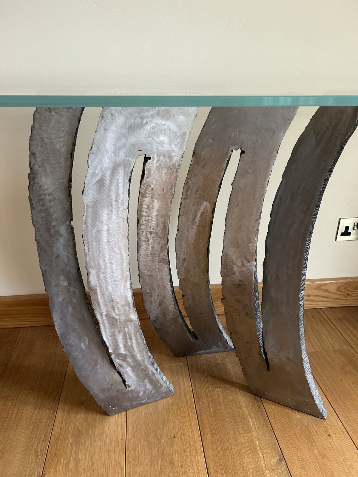 Glass Top And Polished Steel Base Console photo furniture