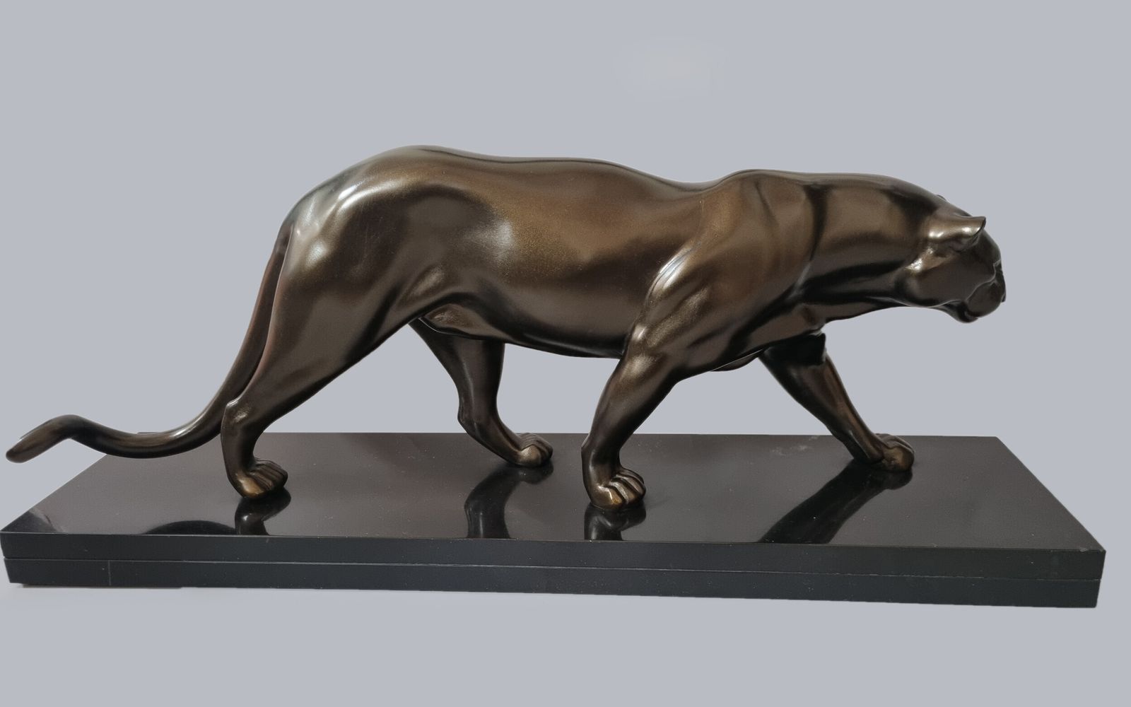 Large French Art Deco Sculpture Of A Spelter Panther Set On A Black Marble Base photo vintage