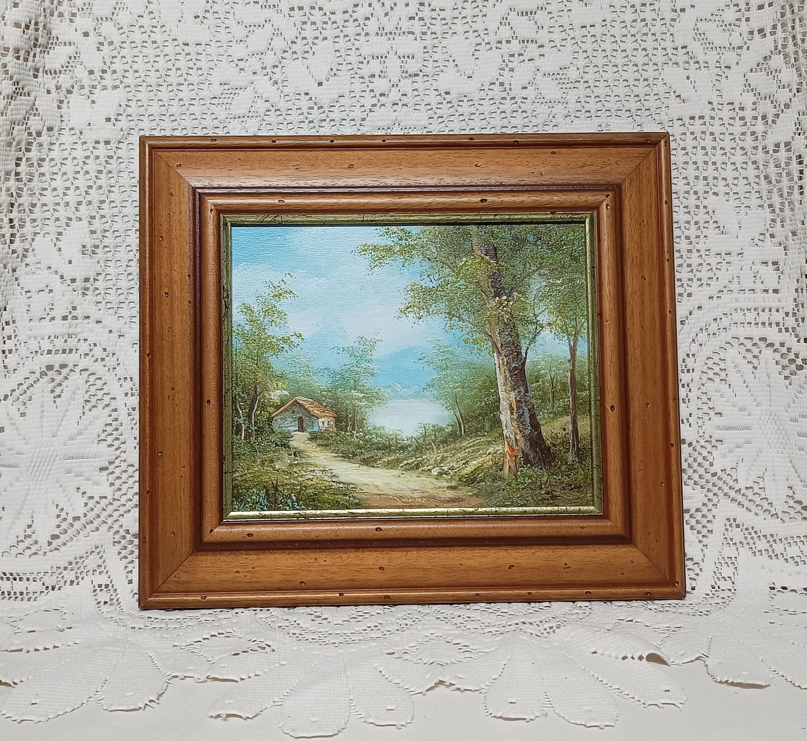 Decorative Oil Painting Mountain Lakeside Cabin Vista Framed In Wooden Frame. photo Art