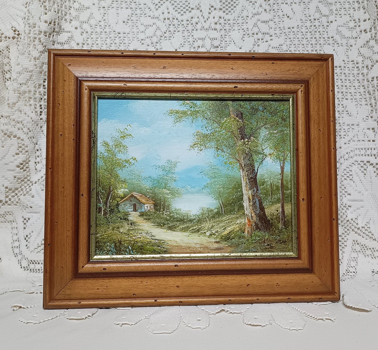 Decorative Oil Painting Mountain Lakeside Cabin Vista Framed In Wooden Frame.