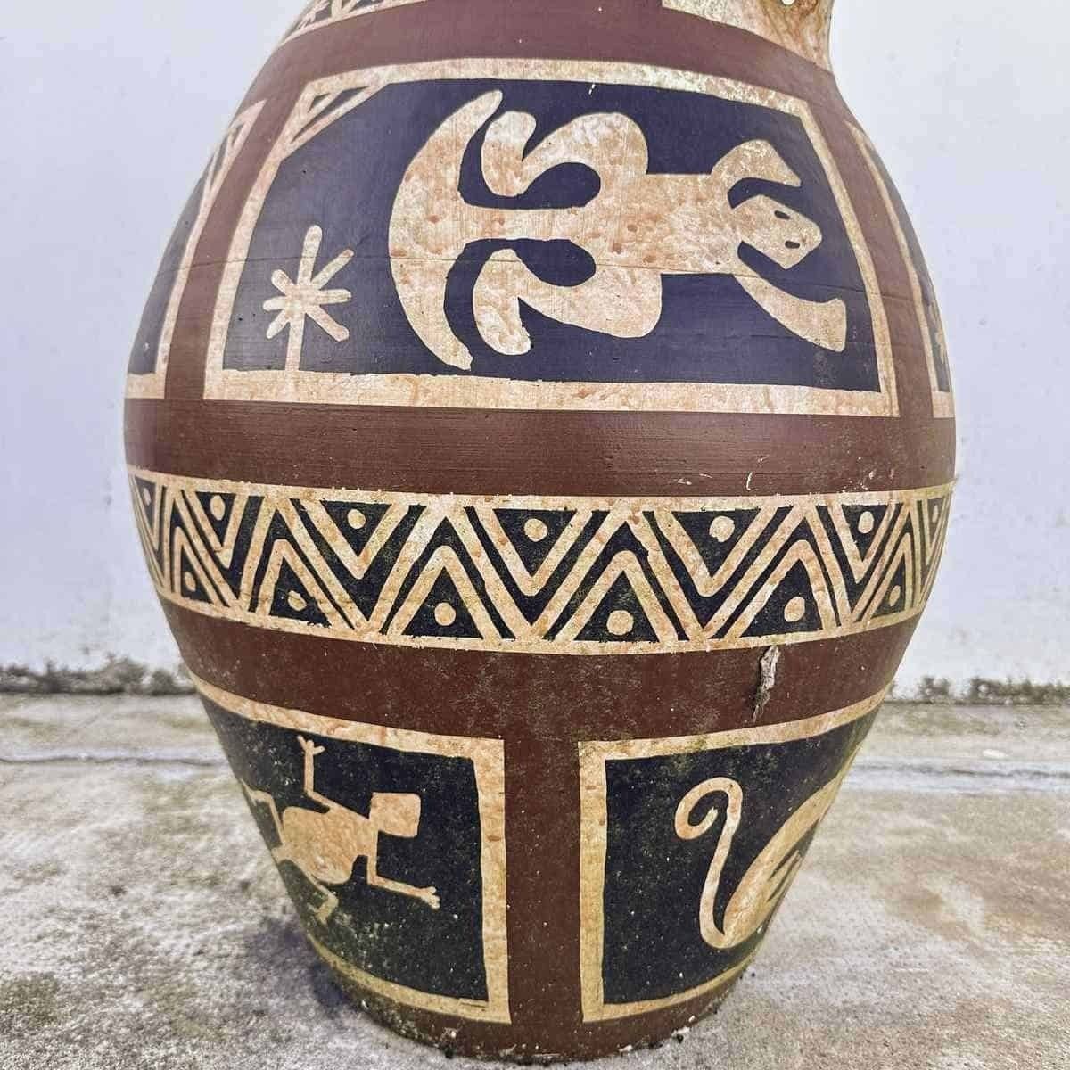 Ceramic Vase Decorated With Ancient Symbols, A Unique Piece That Tells Distant Stories. photo vinterior