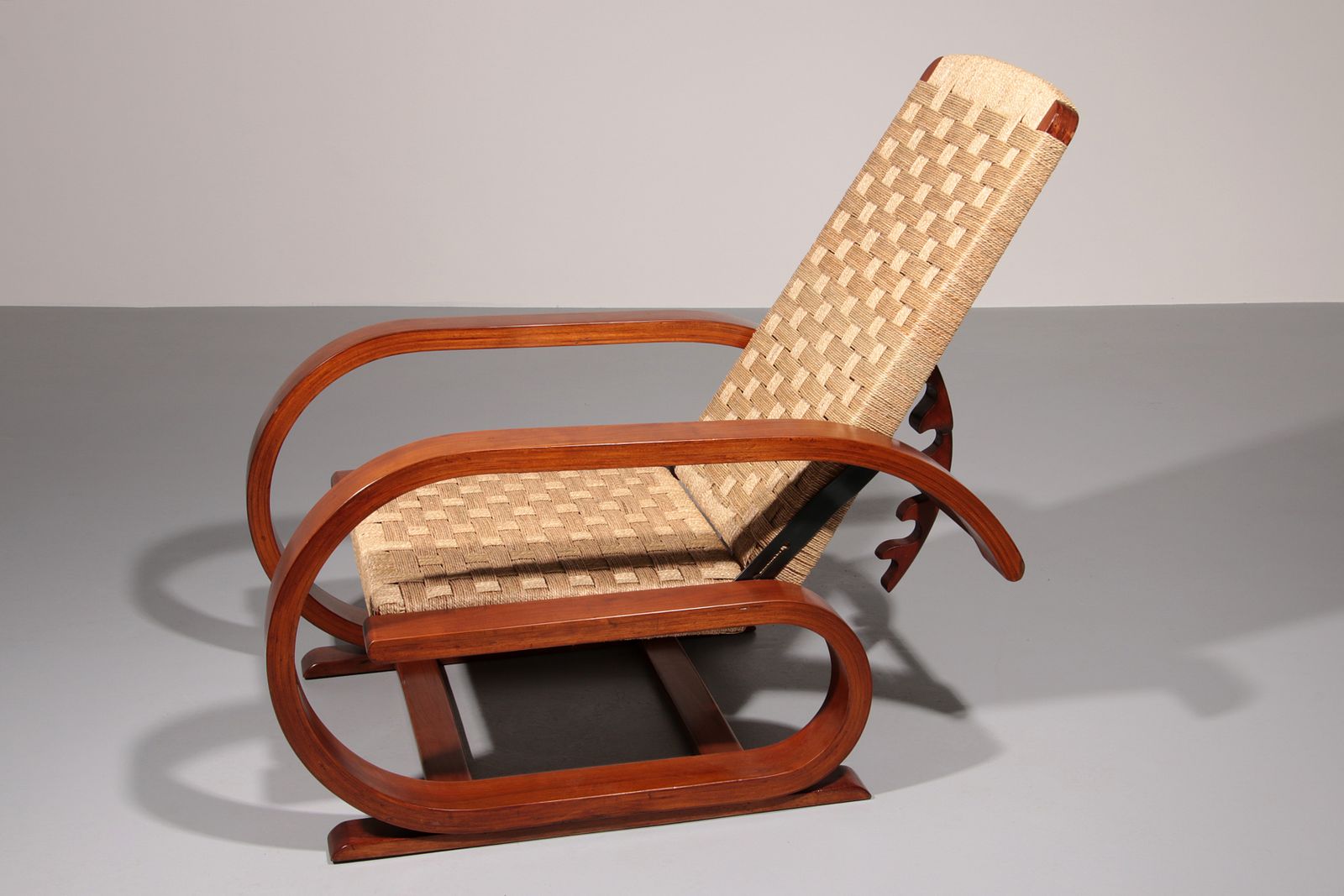 An Exceptionally Rare Mahogany Recliner Crafted In Italy During The 1950s" photo for sale