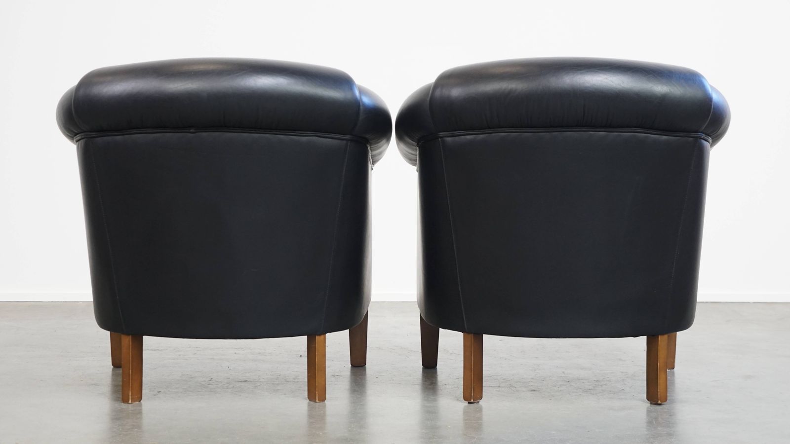 Beautiful Set Of 2 Black English Style Cowhide Club Chairs With A Timeless Design photo for sale