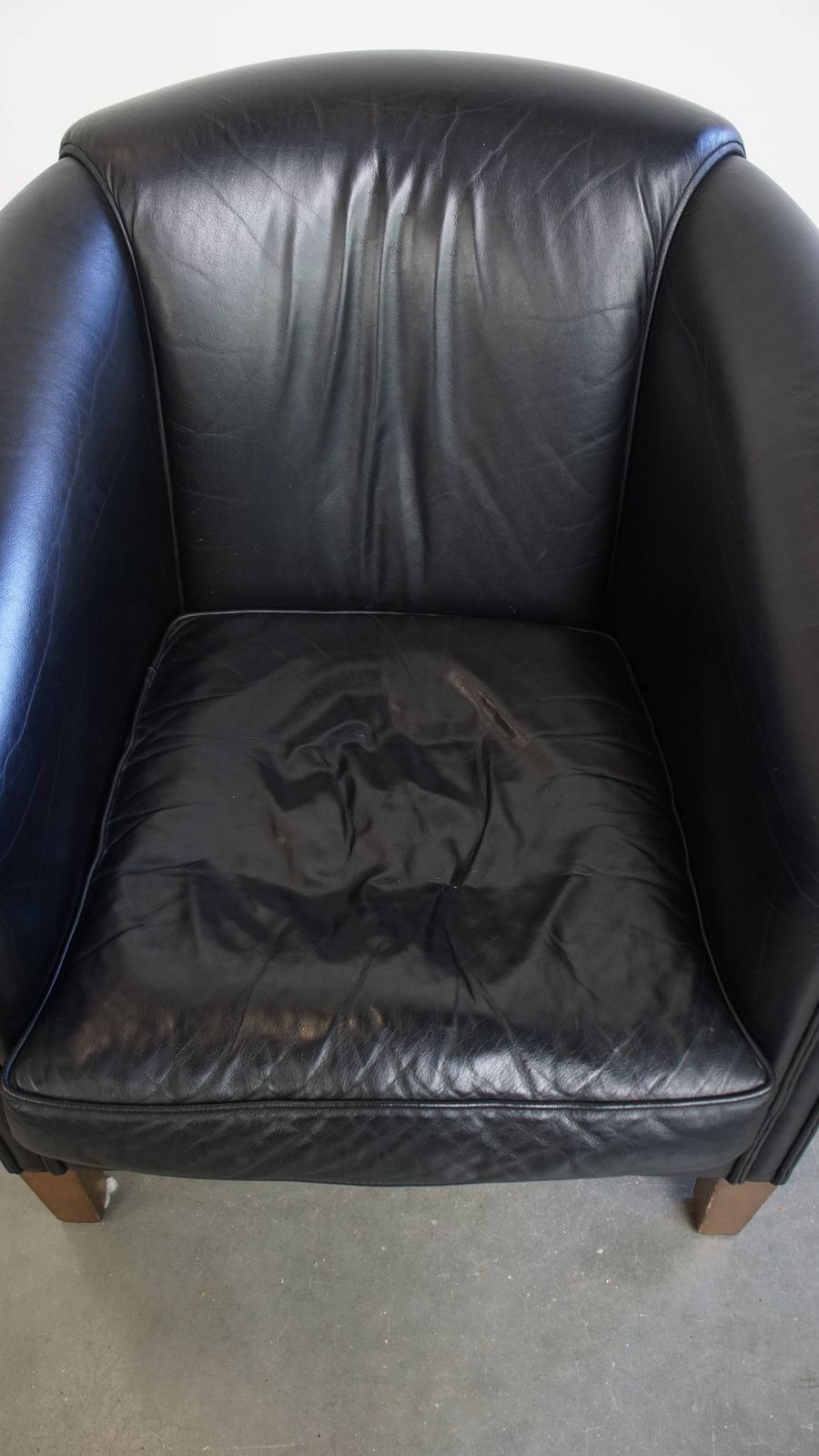 Great Black Cowhide Club Chair In English Style With A Timeless Design photo vinterior