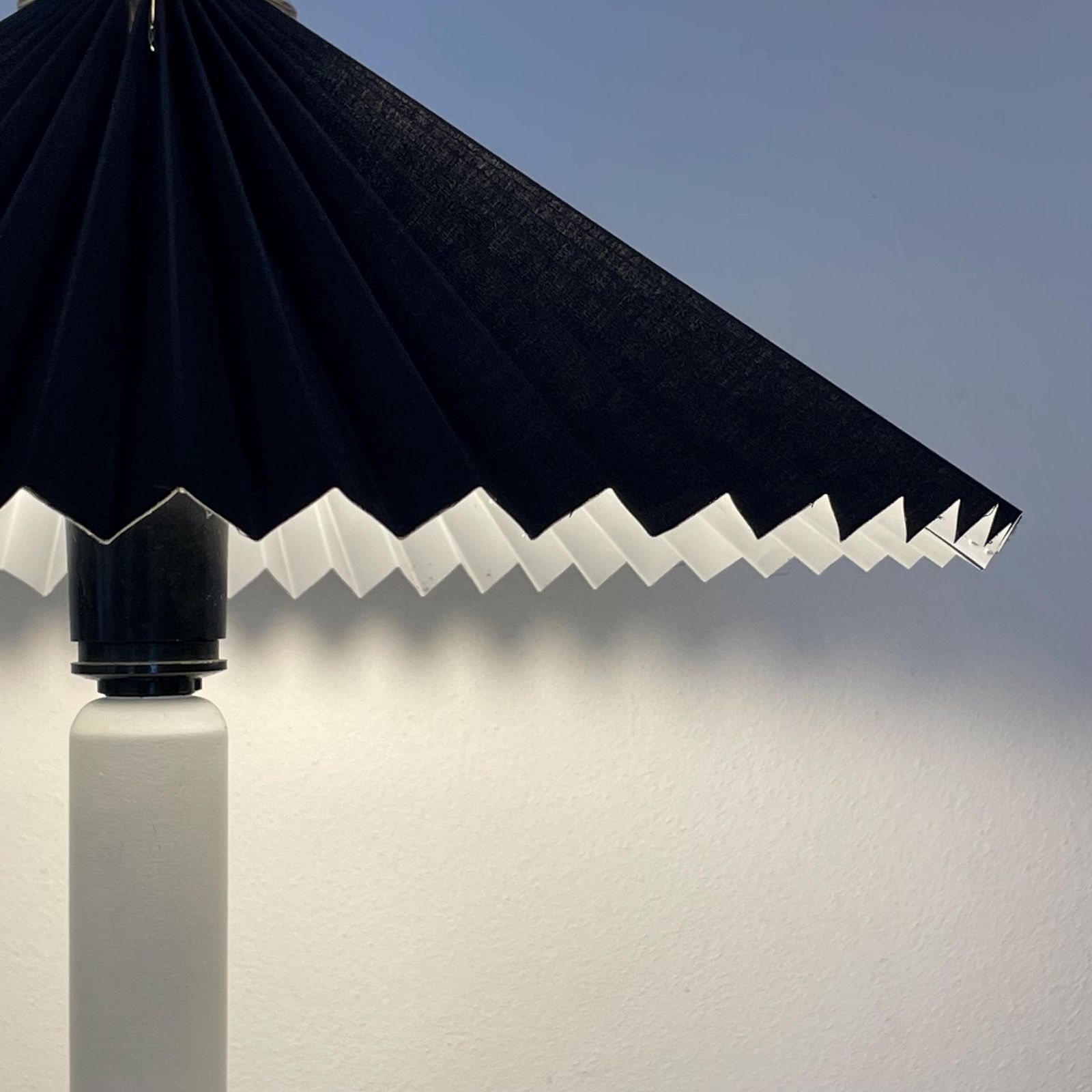 Danish Vintage Mid Century Modern Design Table Lamp With White Wooden Base And Black Pleated Fabric Shade With Cool Plastic Top photo for sale