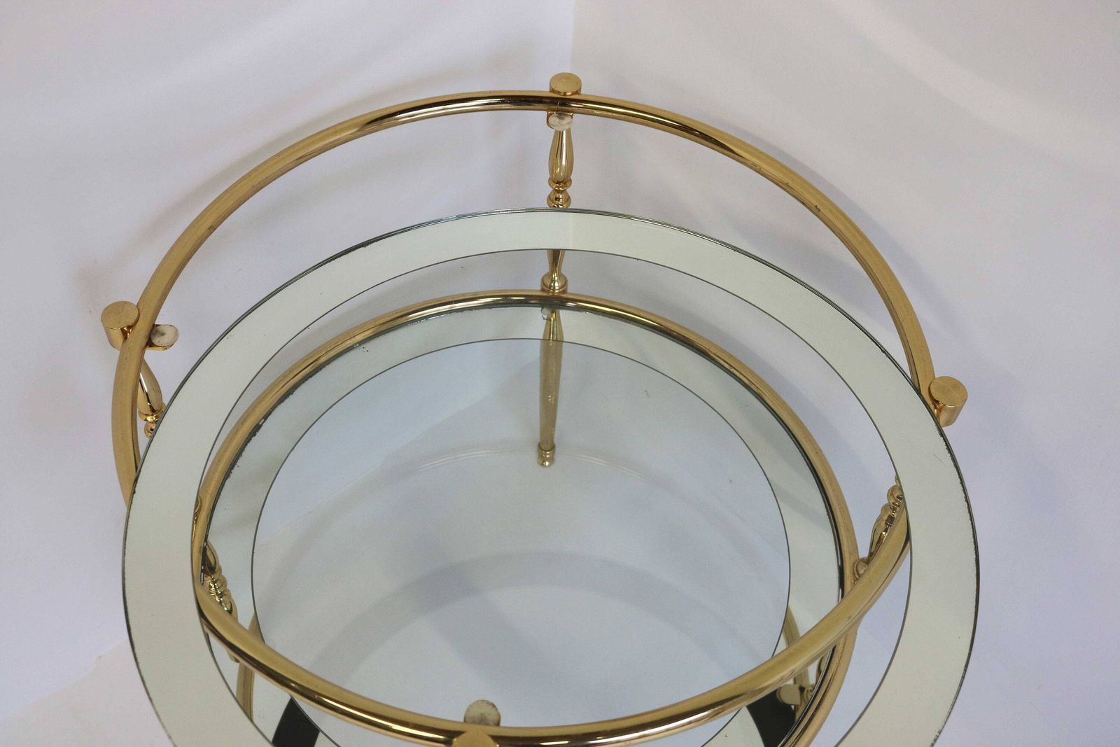 photo furniture Round Brass Side Table With Glass Shelves Surrounded By A Silvered Mirror French. Circa 1970 Hollywood Regency Golden Coffee Table End Table