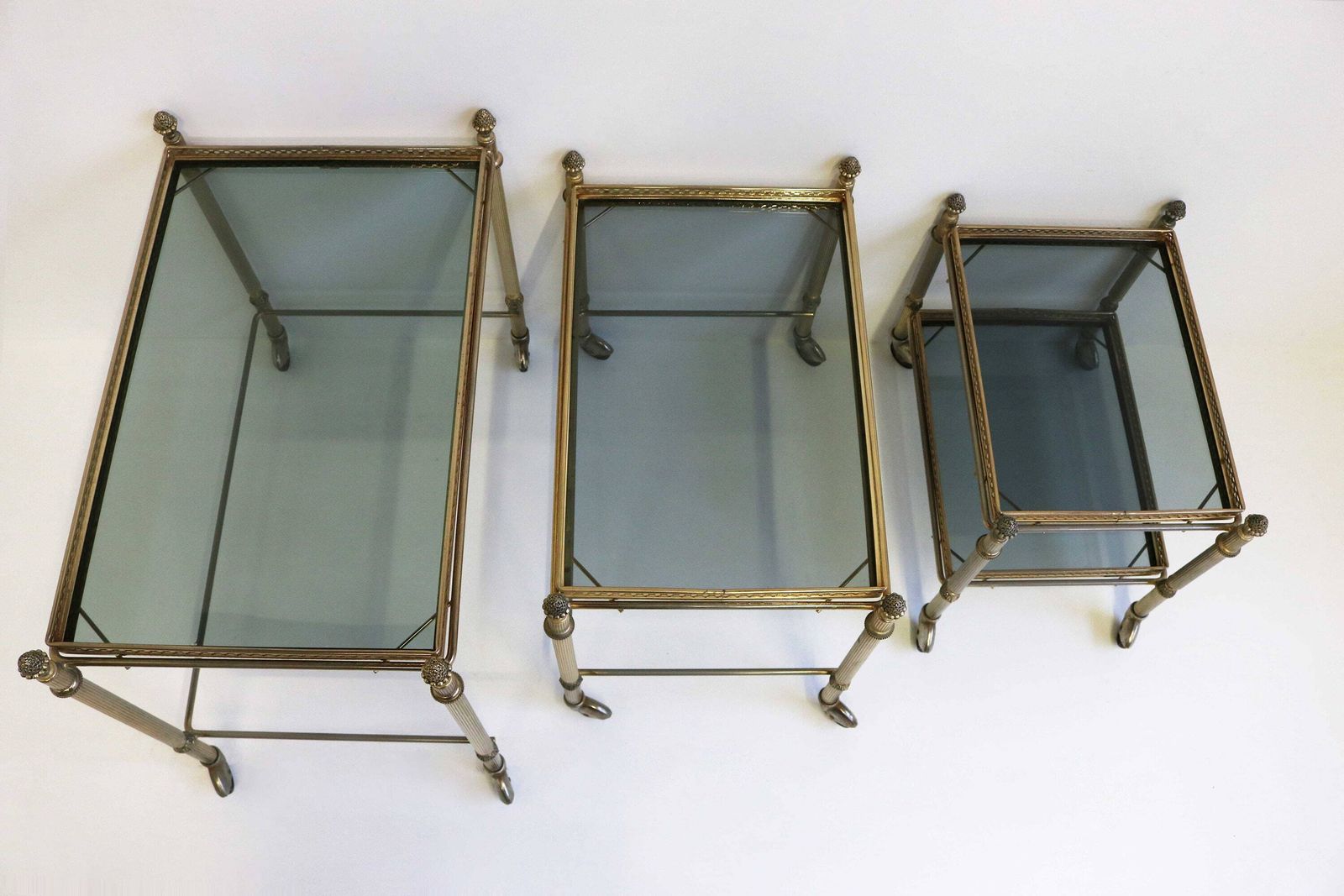 photo furniture Neoclassical French Nesting Tables Maison Baguès Style Mid Century Smoked Glass Nesting Trolleys, Set Of 3 Vintage Side Tables 1960