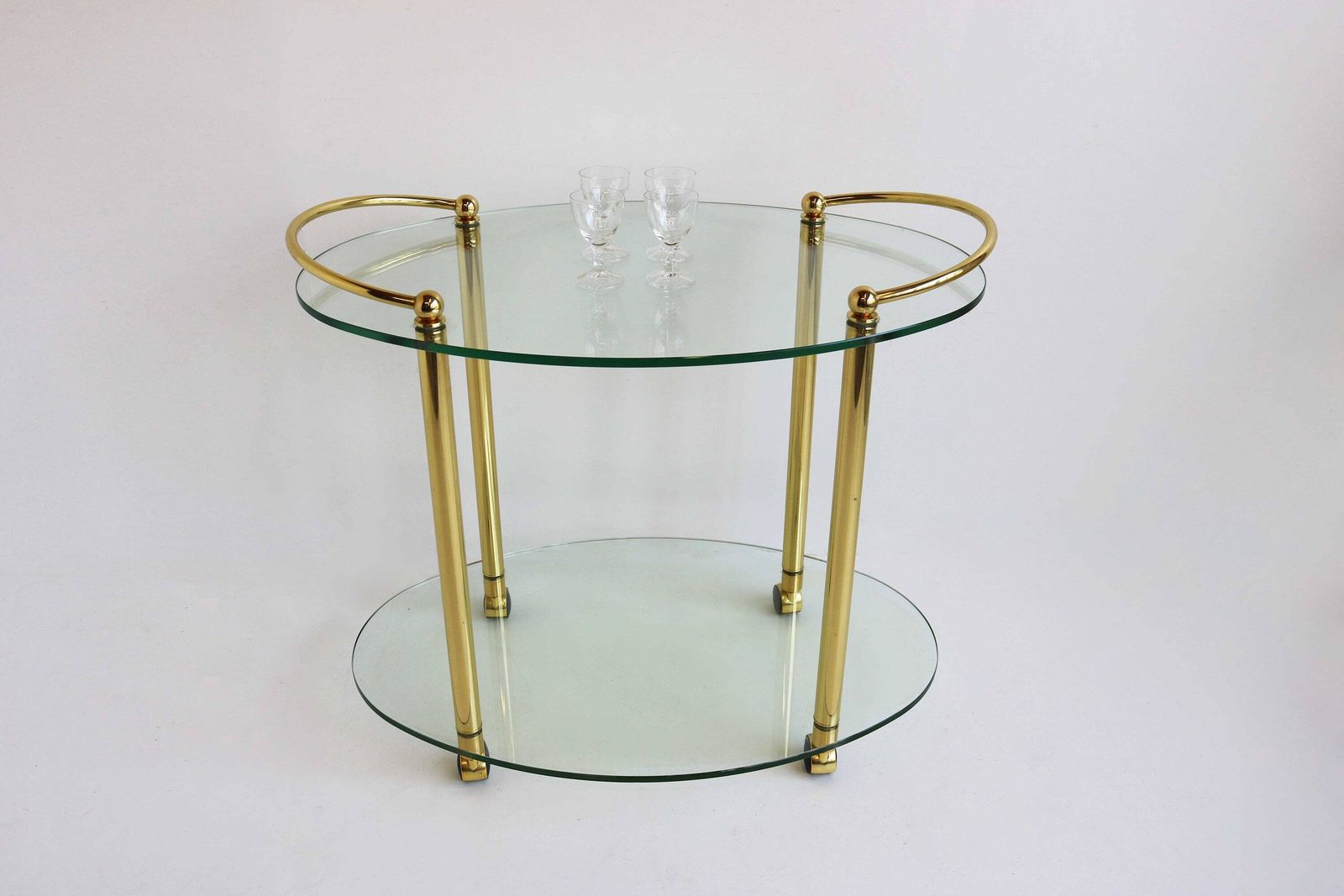 Mid Century Modern Ovale Barcart | Hollywood Regency | Messing En Glas | Ca. 1970 photo furniture