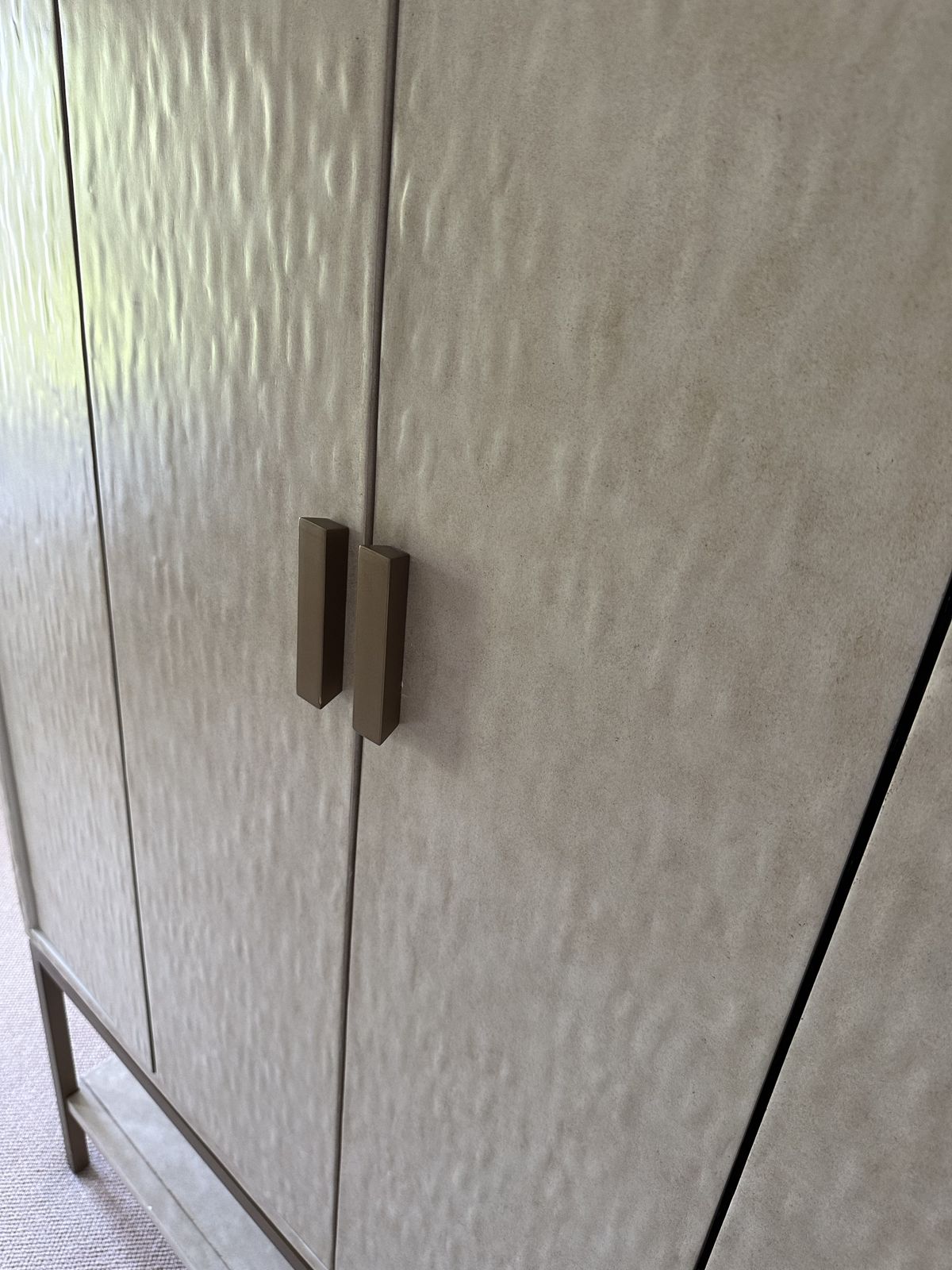 A Gorgeous Drinks Cabinet With Beautiful Panelled Doors And A Gilded Metal Base. Inside It Has An Ornate Mirrored Back With Glass Shelves For A Special Display. The Doors Can Be Neatly Folded Away. photo 1000.0