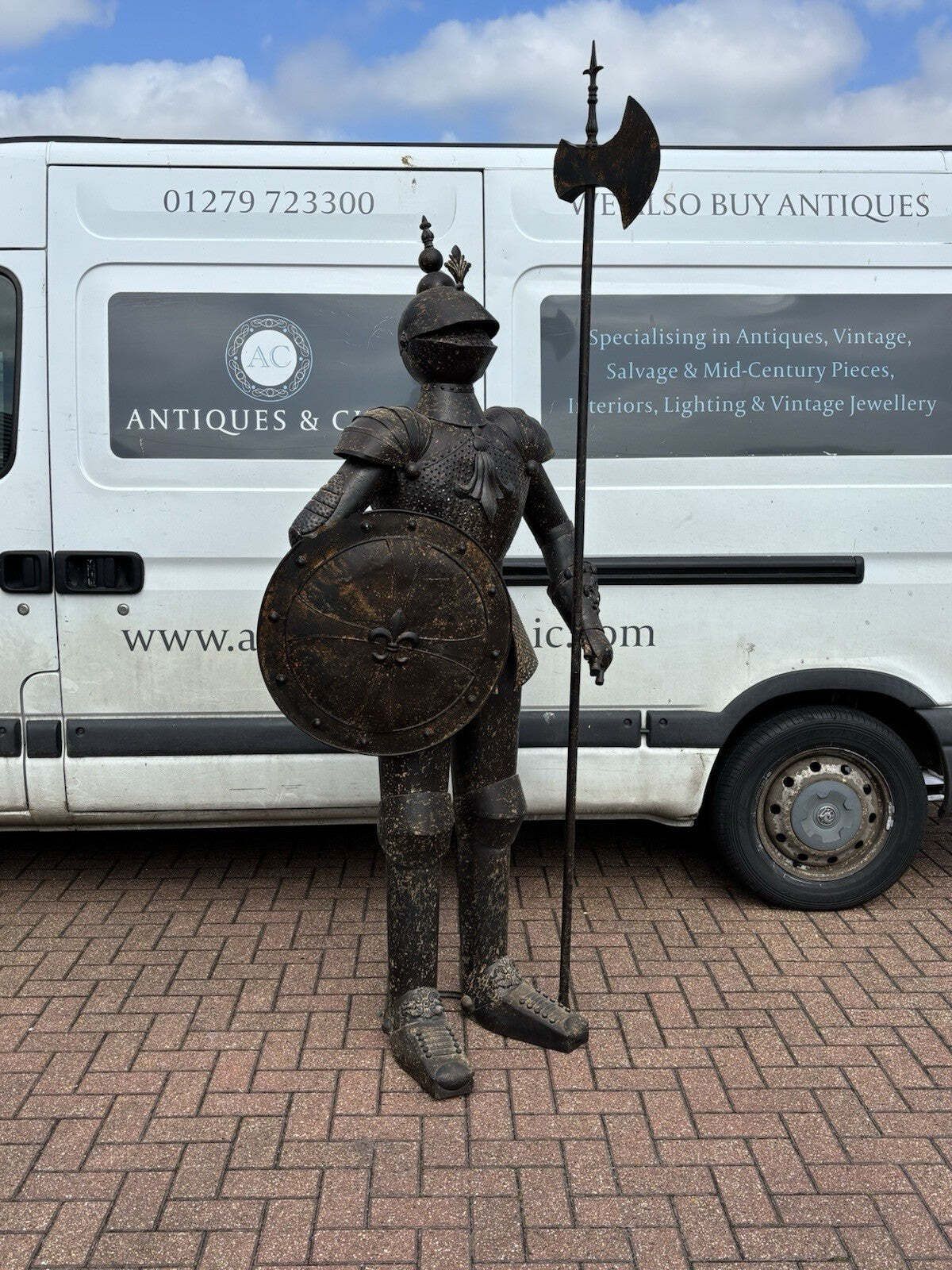 Suit Of Armour. Large And Impressive And Made Of Metal. photo furniture