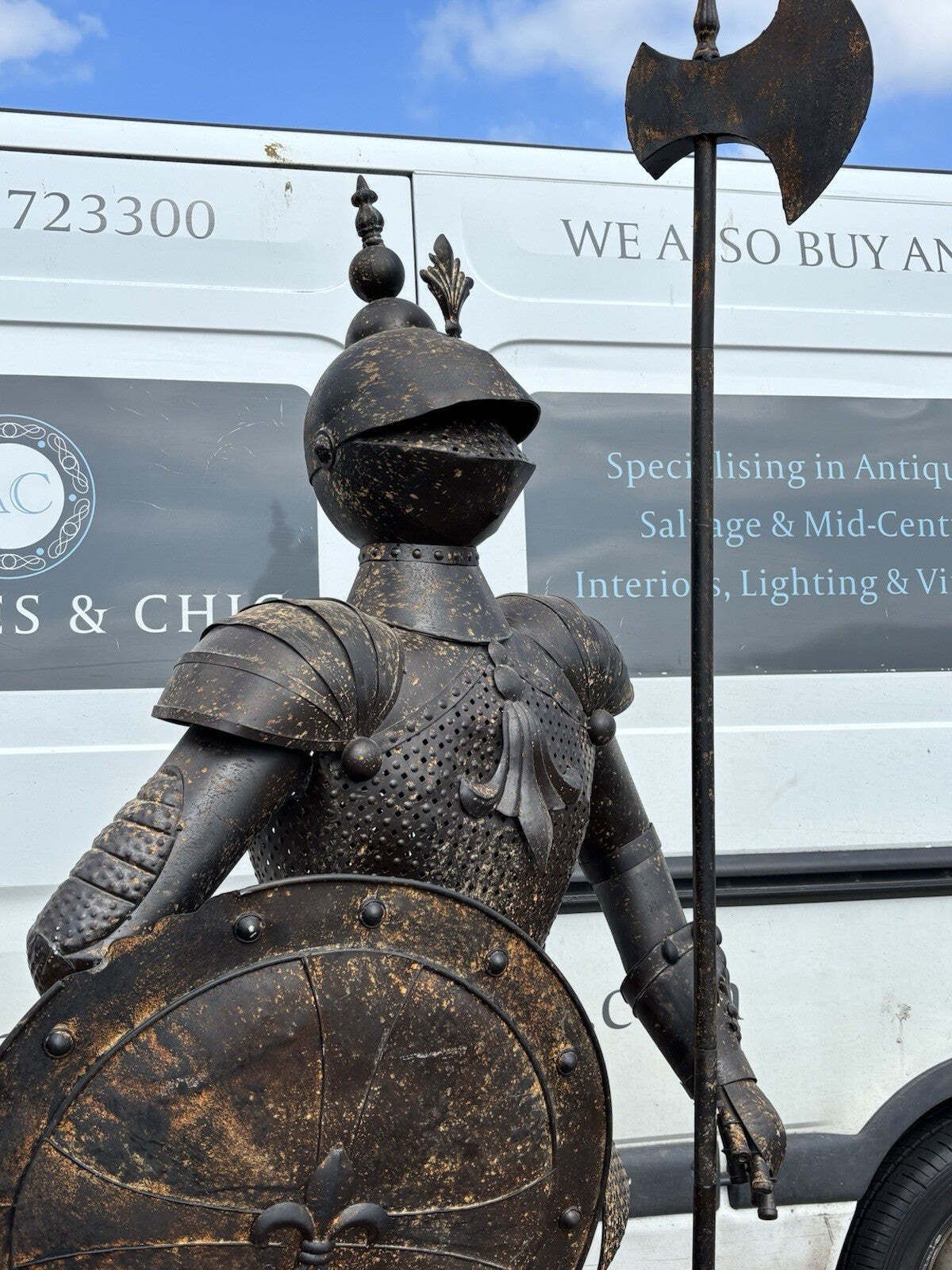 Suit Of Armour. Large And Impressive And Made Of Metal. photo vinterior