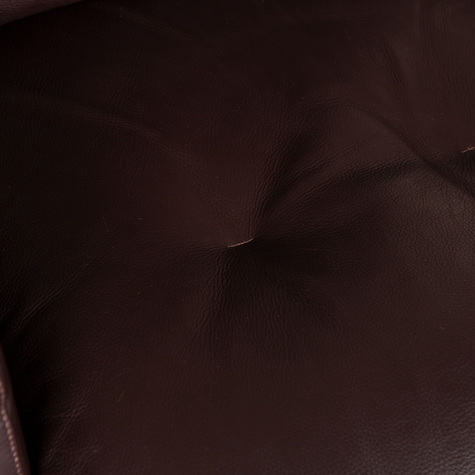 Fauteuil pivotant Cor Conseta en cuir brun photo Mobilier