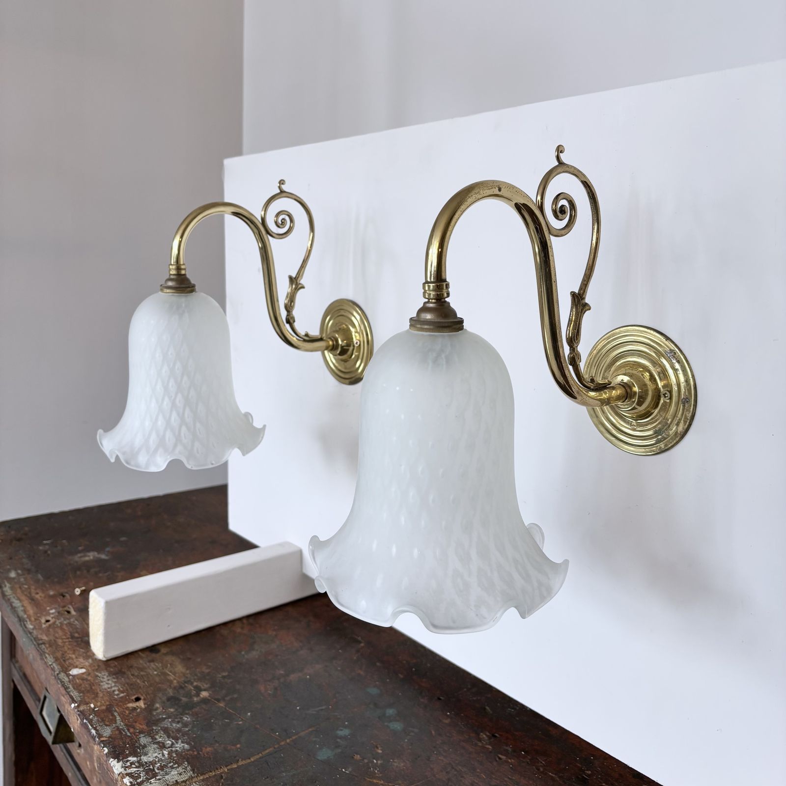 Pair Of Polished Brass Wall Lights With Frosted Harlequin Shades photo Lighting