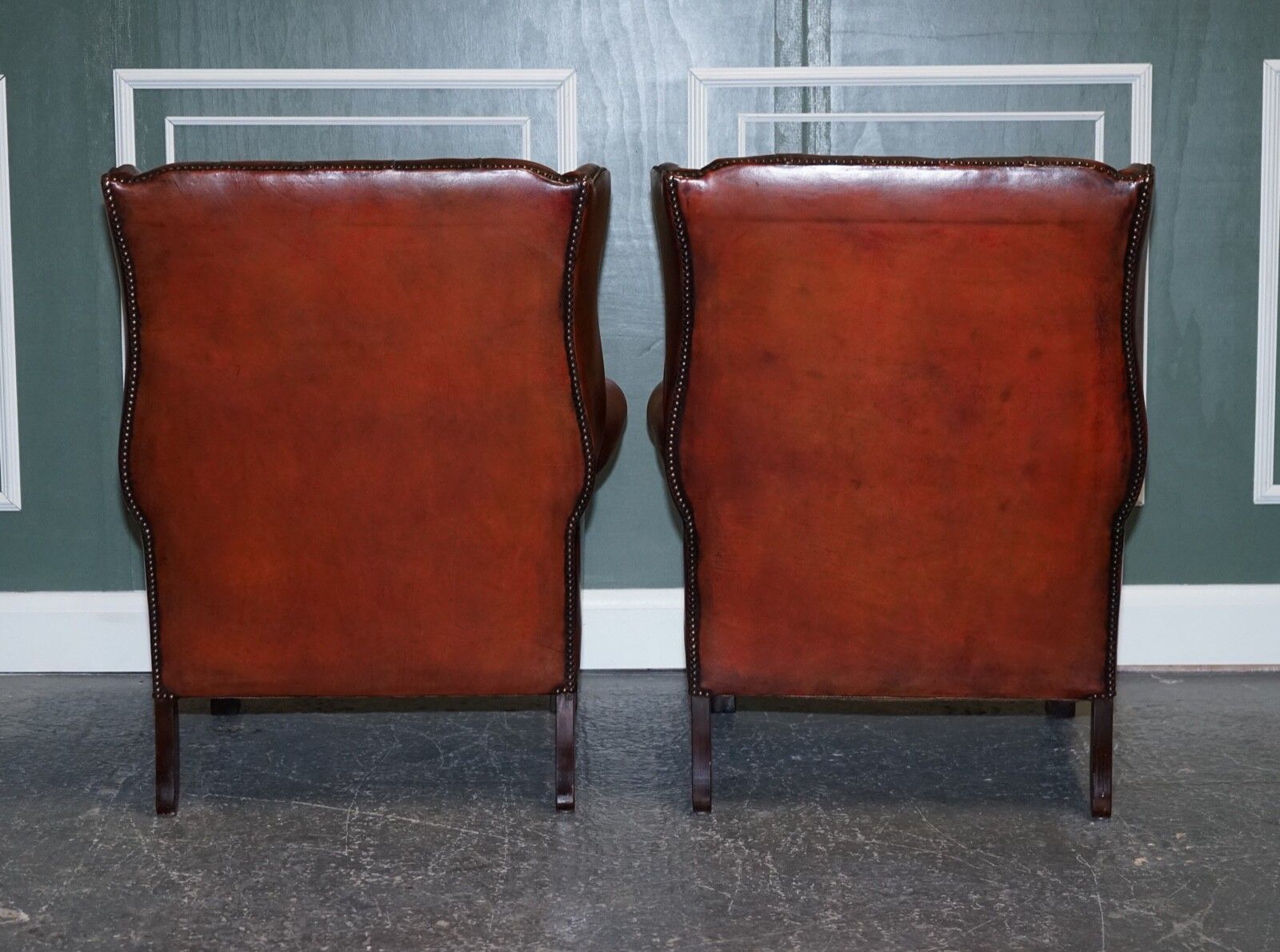 photo vintage Stunning Pair Of Burgundy Brown Leather Hand Dyed Wingback Chairs