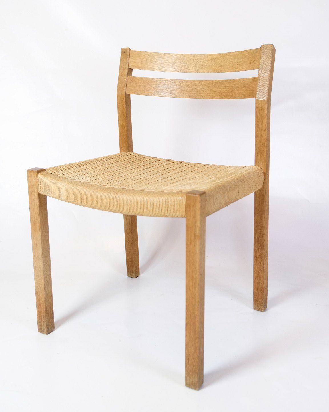 Set Of Five Dining Chairs Model 401 In Oak  & Plank Wicker By Jørgen Henrik Møller For Jl Møllers Furniture Factory  From 1960s photo for sale