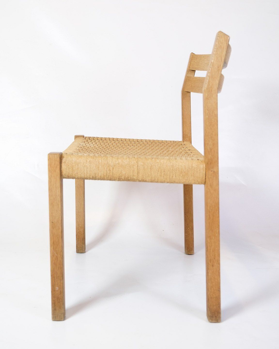 Set Of Five Dining Chairs Model 401 In Oak  & Plank Wicker By Jørgen Henrik Møller For Jl Møllers Furniture Factory  From 1960s photo vinterior