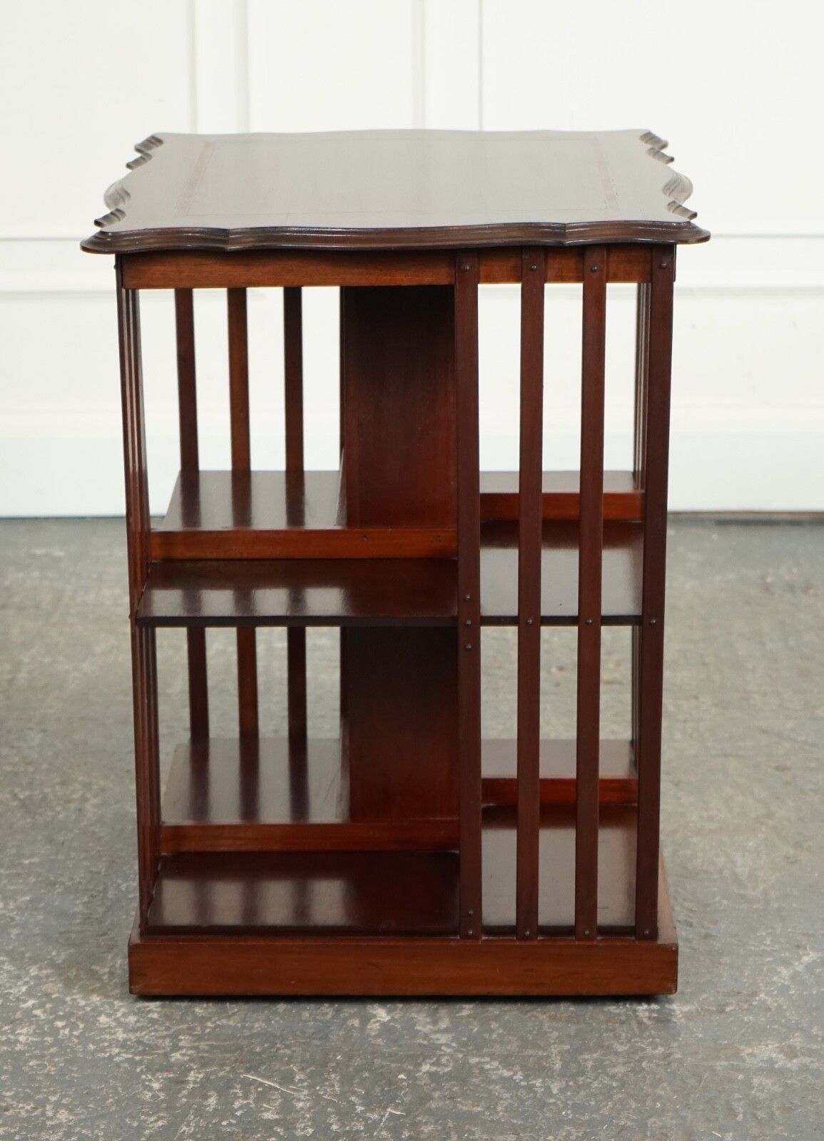 Antique Edwardian Revolving Bookcase With A Serpentine Shaped Top photo for sale