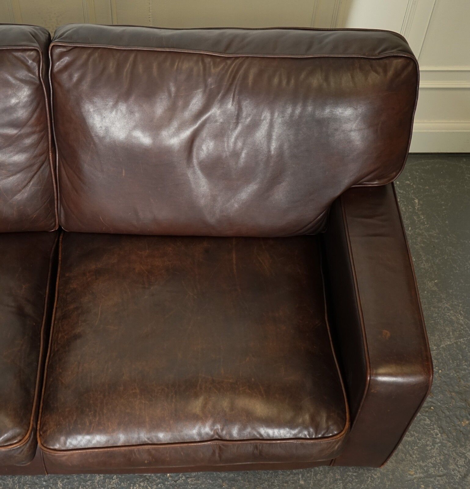 Furniture Vintage Distressed Brown Leather Two To Three Seater Sofa photo