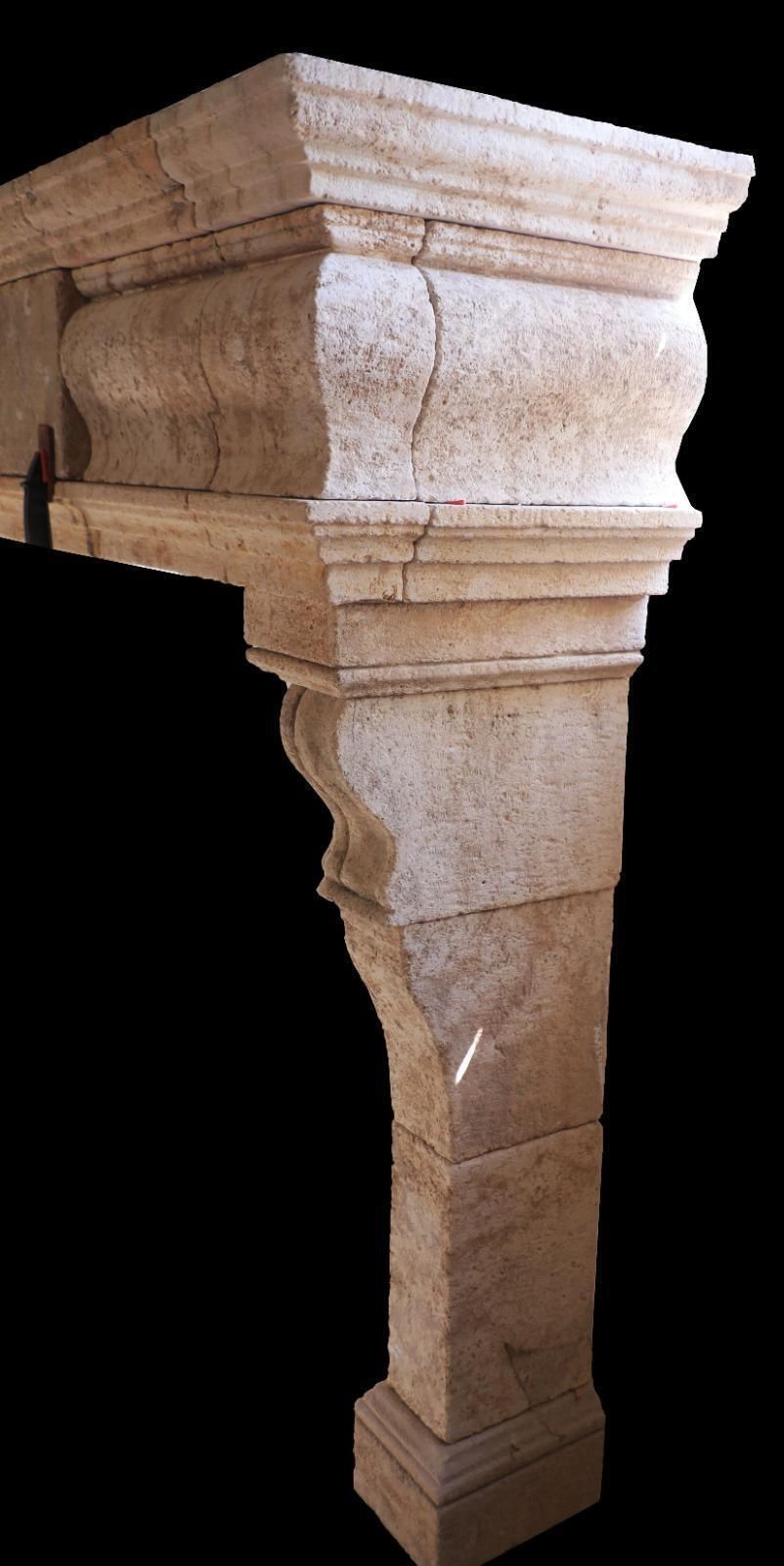 20th Century French Limestone Fireplace With Stacked Molding And Sculpted Jambs photo for sale