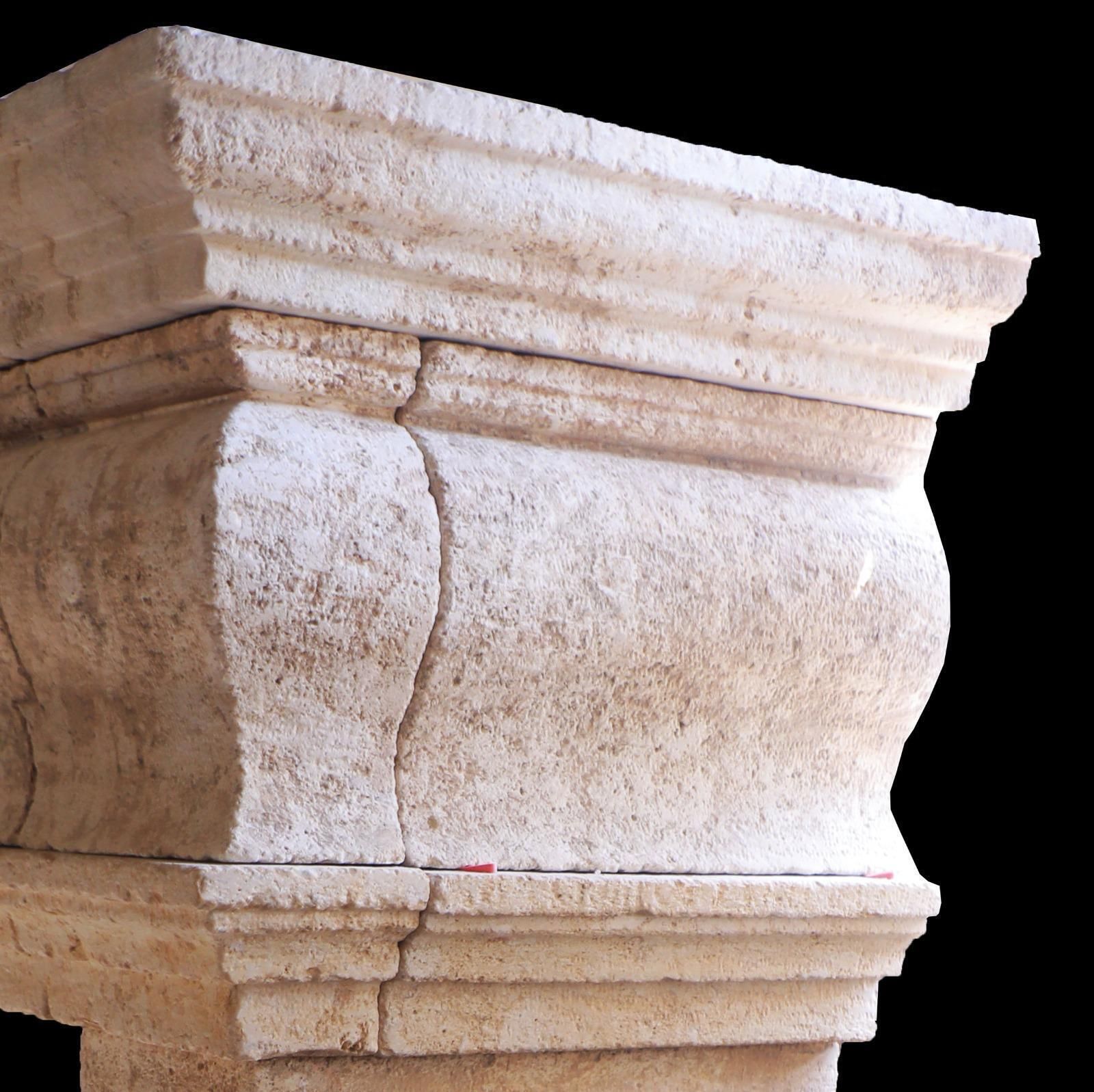 20th Century French Limestone Fireplace With Stacked Molding And Sculpted Jambs photo 15500.0