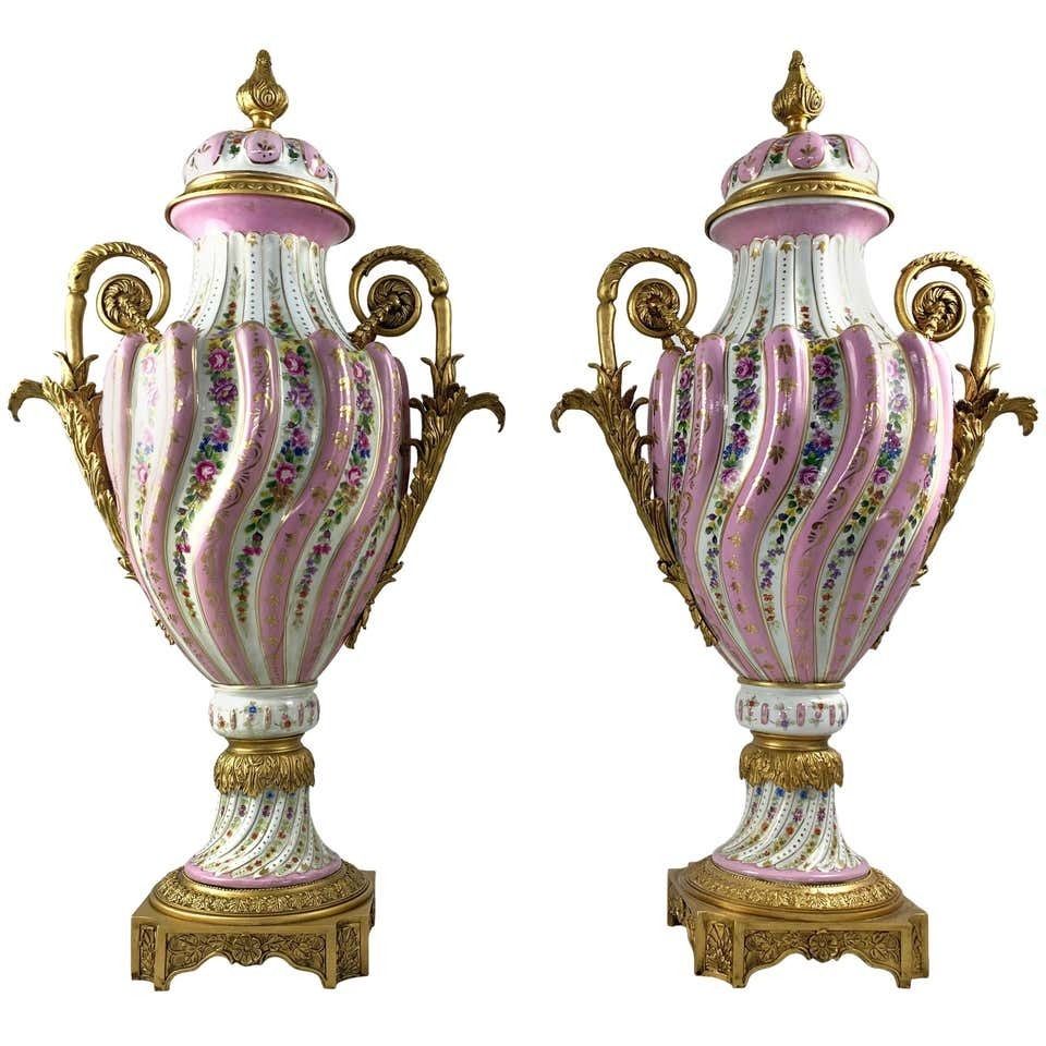 20th Century Pair Of Ormolu Mounted Pink Sevres Vases With Lids