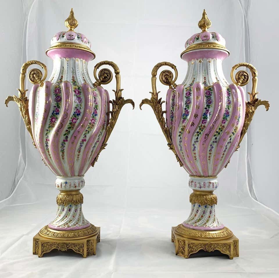 20th Century Pair Of Ormolu Mounted Pink Sevres Vases With Lids photo for sale